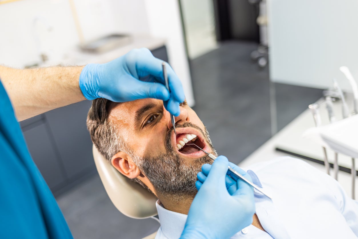 Patients are advised to consult their dentist if they experience side effects such as dry mouth