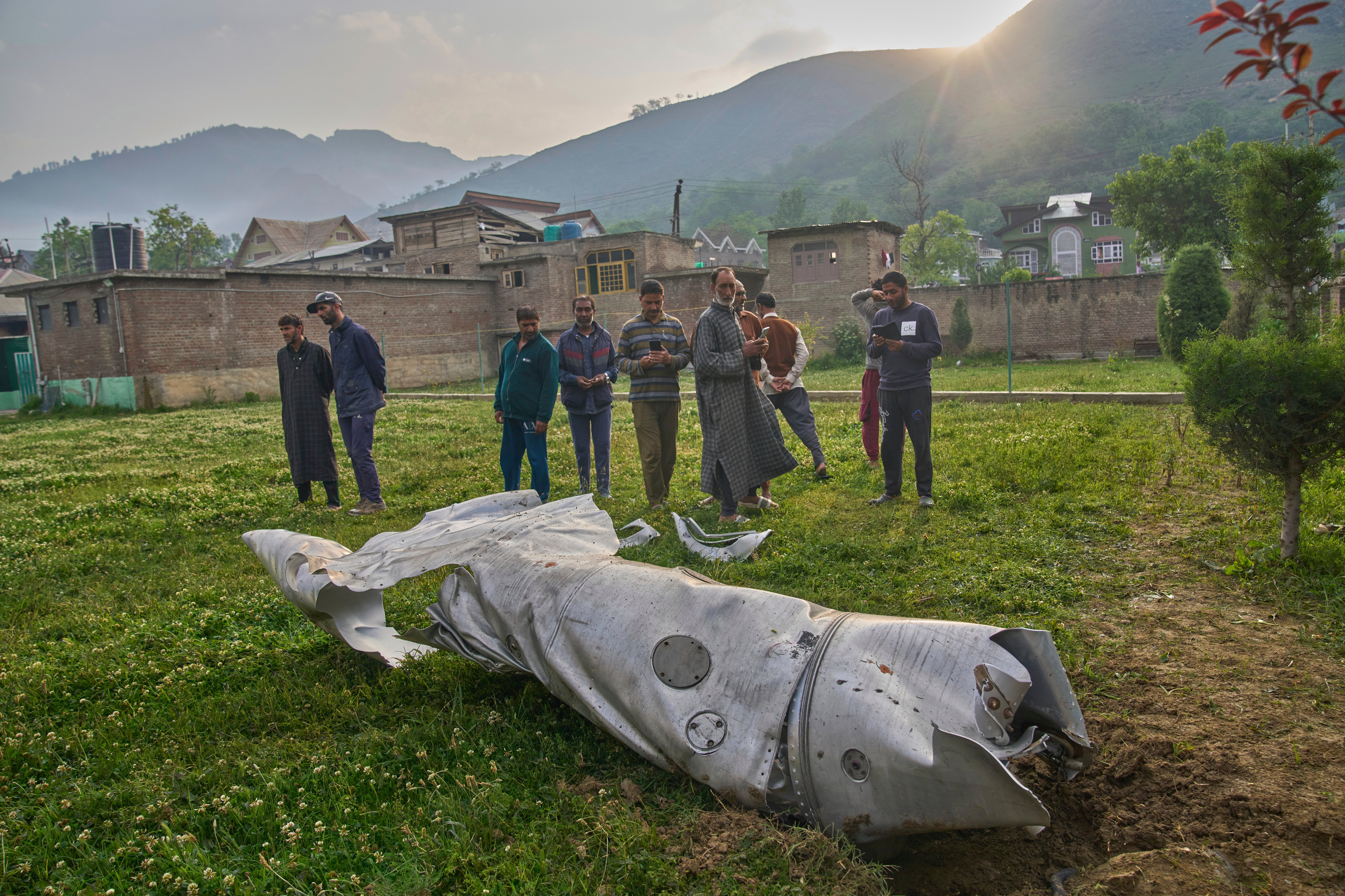 Suspected debris from an Indian aircraft lies in the compound of a mosque in Pampore, Kashmir