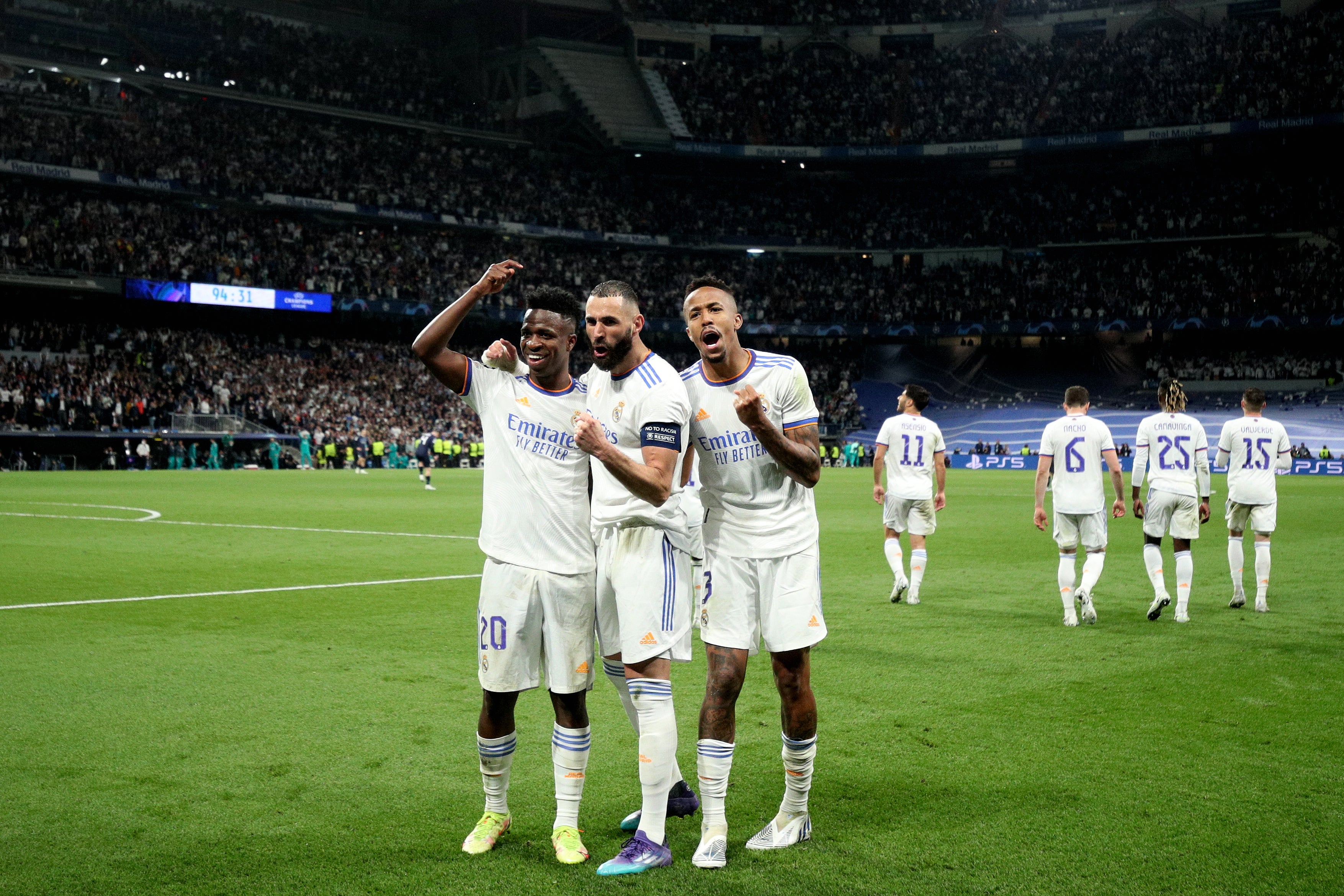 Real Madrid celebrate scoring their third goal against Man City in 2022