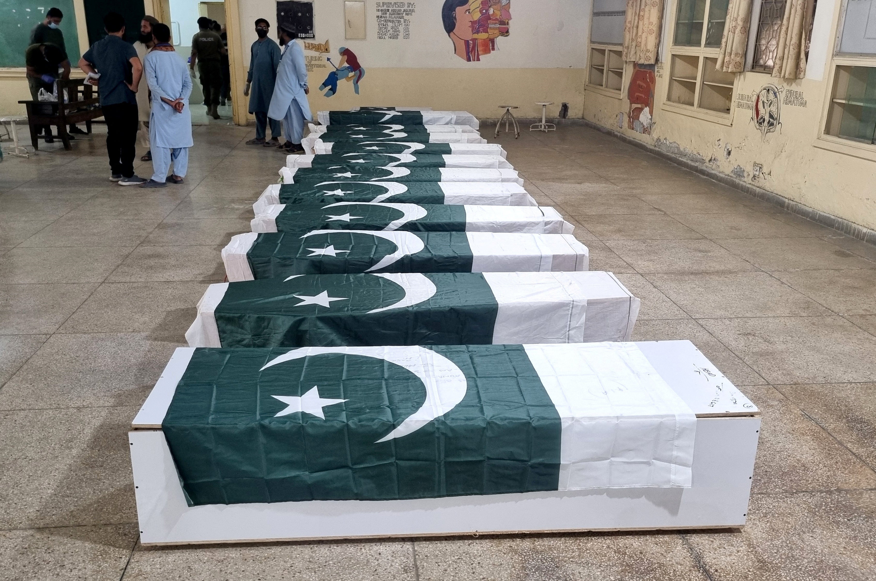 Men gather for funeral prayers for victims of the Indian missile strike on Bahawalpur early on Wednesday