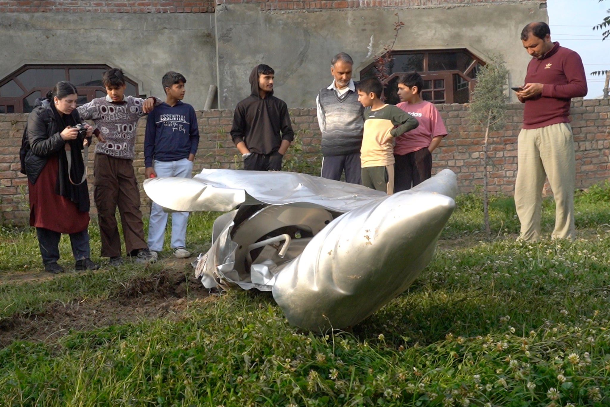 Aircraft debris is seen in Kashmir’s Pampore area