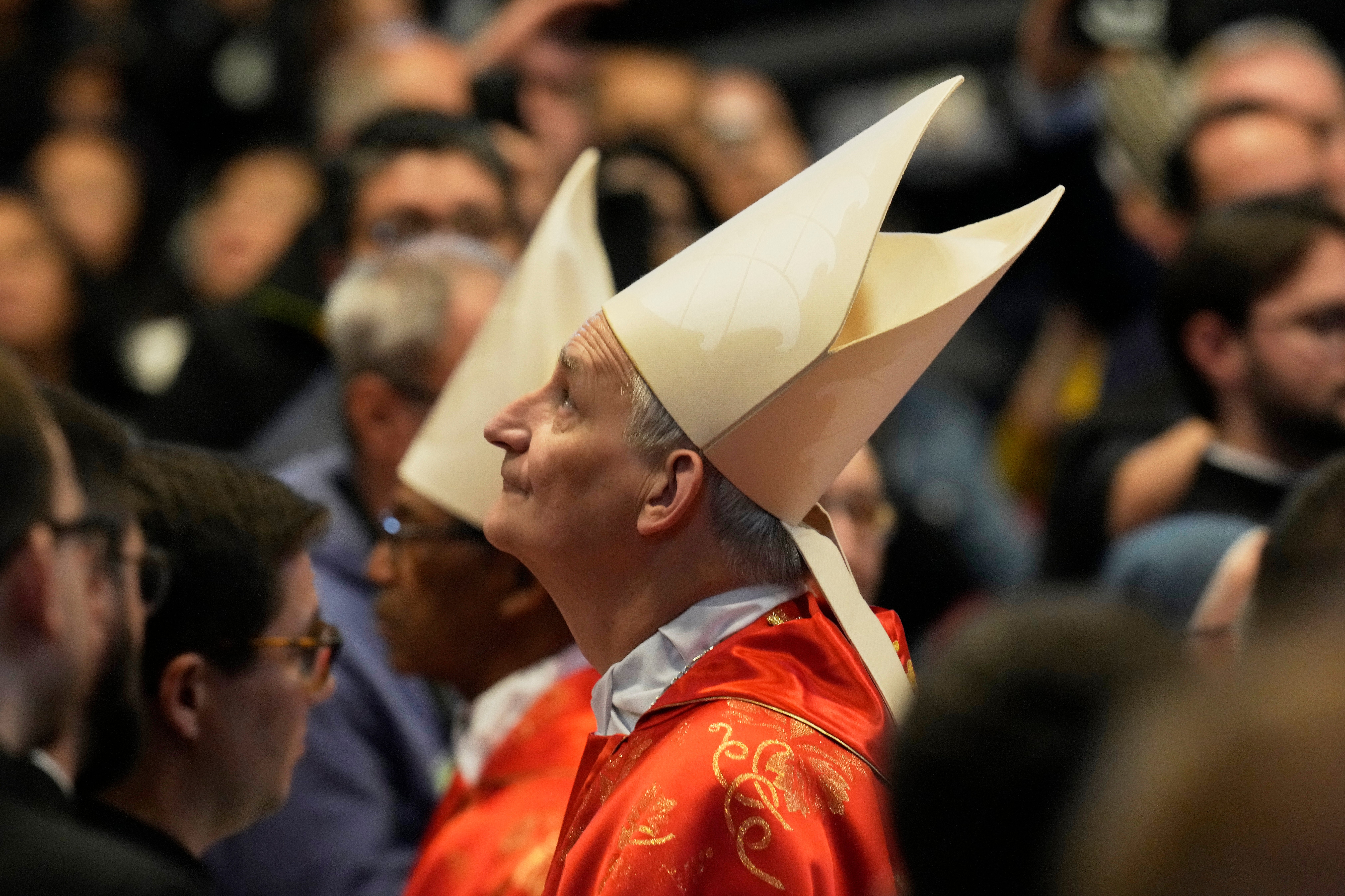 Cardinal Matteo Maria Zuppi looks up during a final mass celebrated by cardinals inside St Peter’s Basilica, before the conclave to elect a new pope