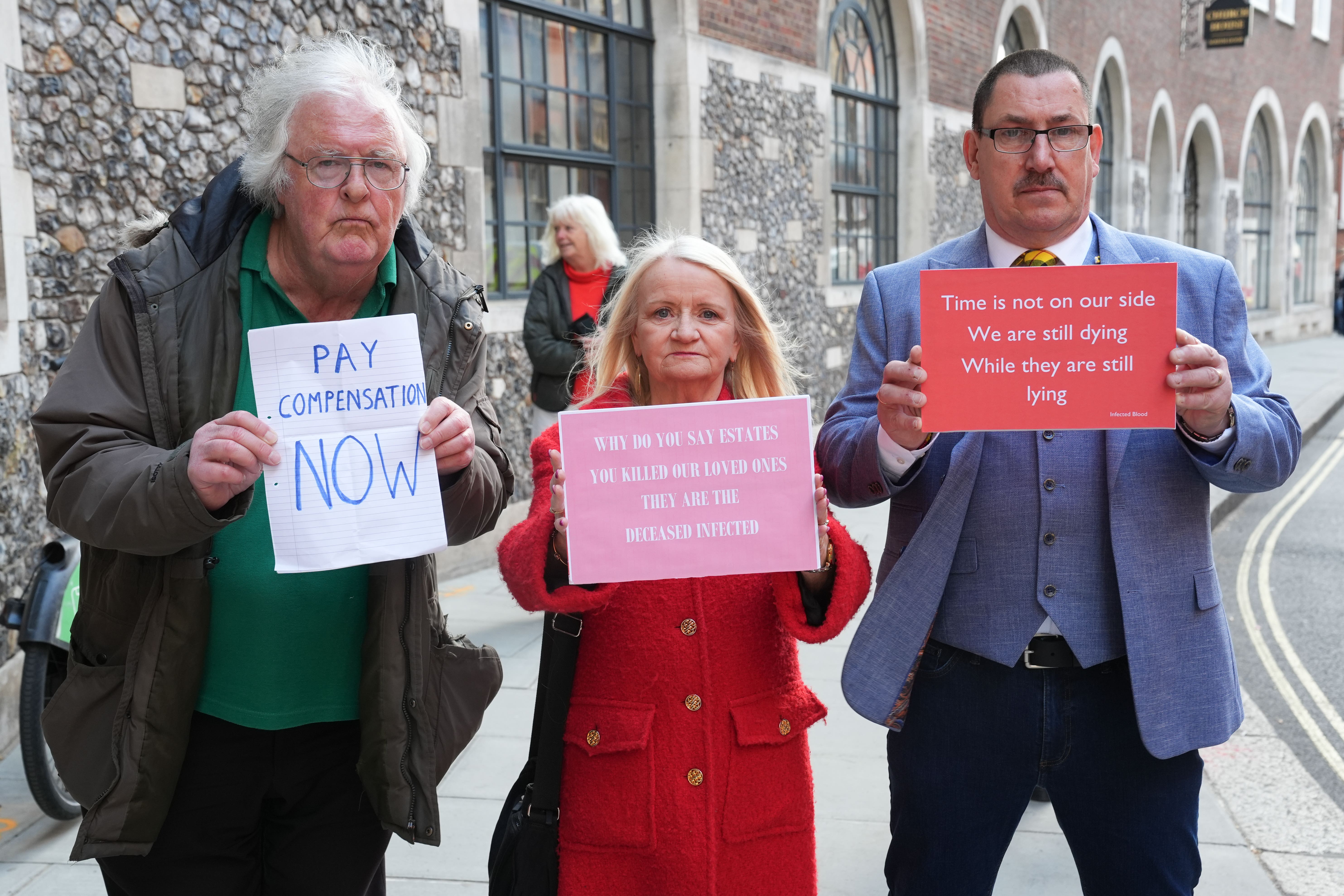 Protesters gathered outside the Infected Blood Inquiry at Church House, in Westminster, London, which is hearing evidence on the timeliness and adequacy of the Government’s response to compensation (Lucy North/PA)