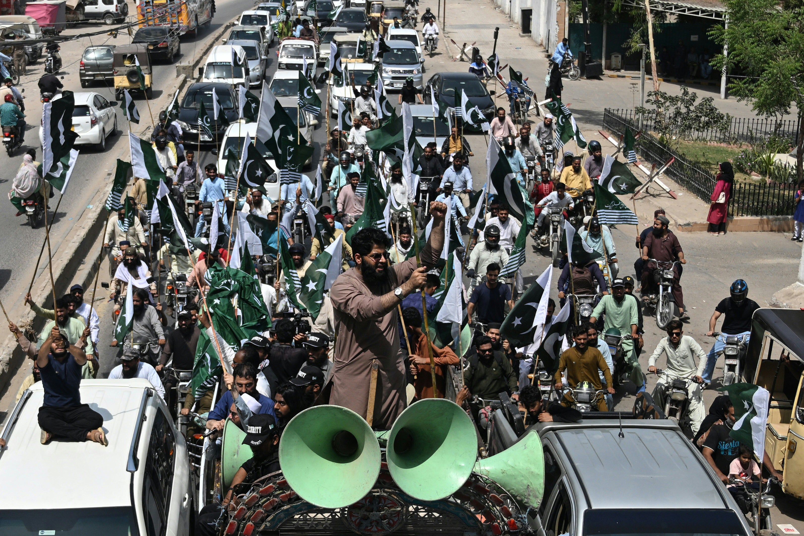 Activists of Pakistan Markazi Muslim League shout slogans during an anti-India protest rally in Karachi on May 7, 2025. India launched missile strikes against arch-rival Pakistan in the early hours of May 7, two weeks after it blamed Islamabad for a deadly tourist attack on the Indian-run side of the disputed Kashmir. At least 38 deaths were reported, with Islamabad saying 26 civilians were killed by the Indian strikes and firing along the border, and New Delhi adding at least 12 dead from Pakistani shelling. (Photo by Rizwan TABASSUM / AFP) (Photo by RIZWAN TABASSUM/AFP via Getty Images)