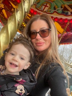 Ms Emes, pictured with her granddaughter Nelly, says she suffers ongoing chest pain