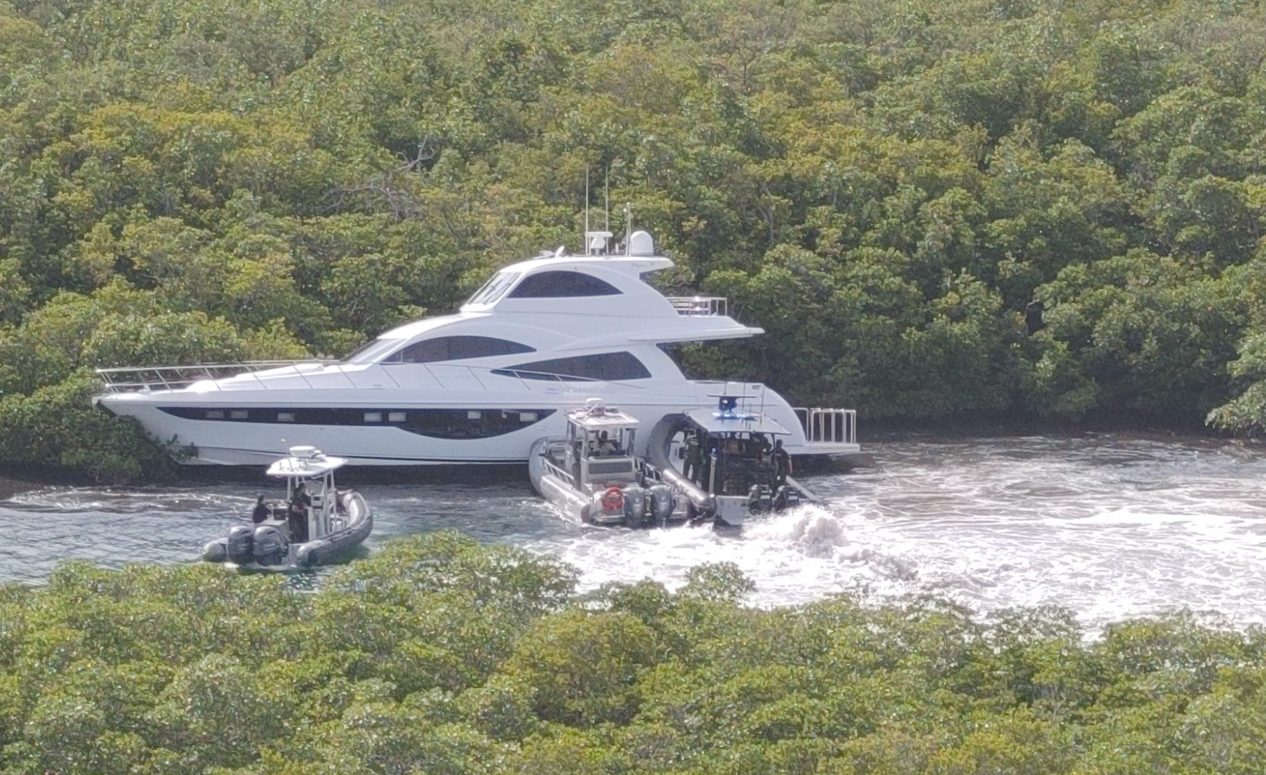 Officers from Martin County ground units, marine units, and a SWAT team were forced to ram the yacht into nearby mangroves in order to ground it and apprehend the suspect