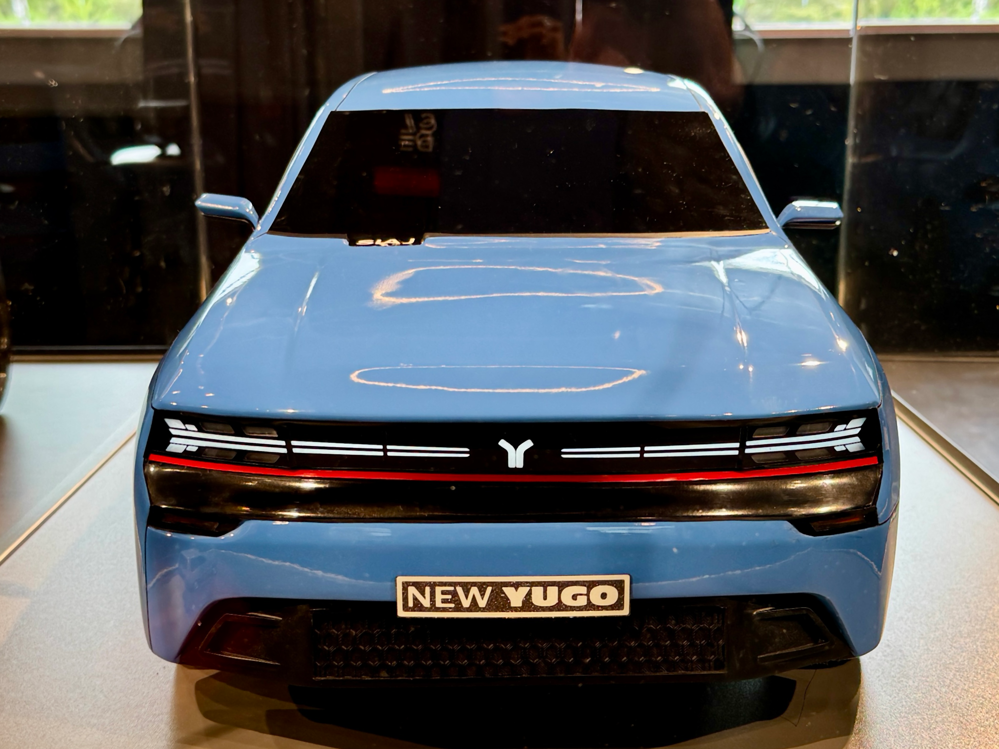 The old air intake on the Yugo bonnet has been replaced with a badge under the windscreen