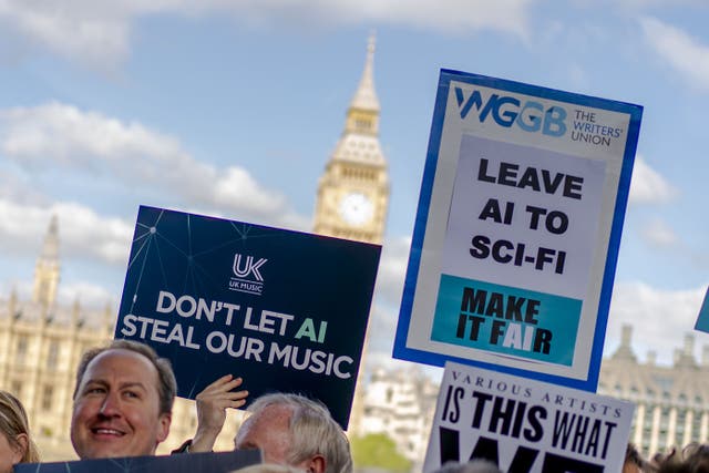 <p>Music creators and politicians take part in a protest on the Albert Embankment, opposite the Houses of Parliament</p>