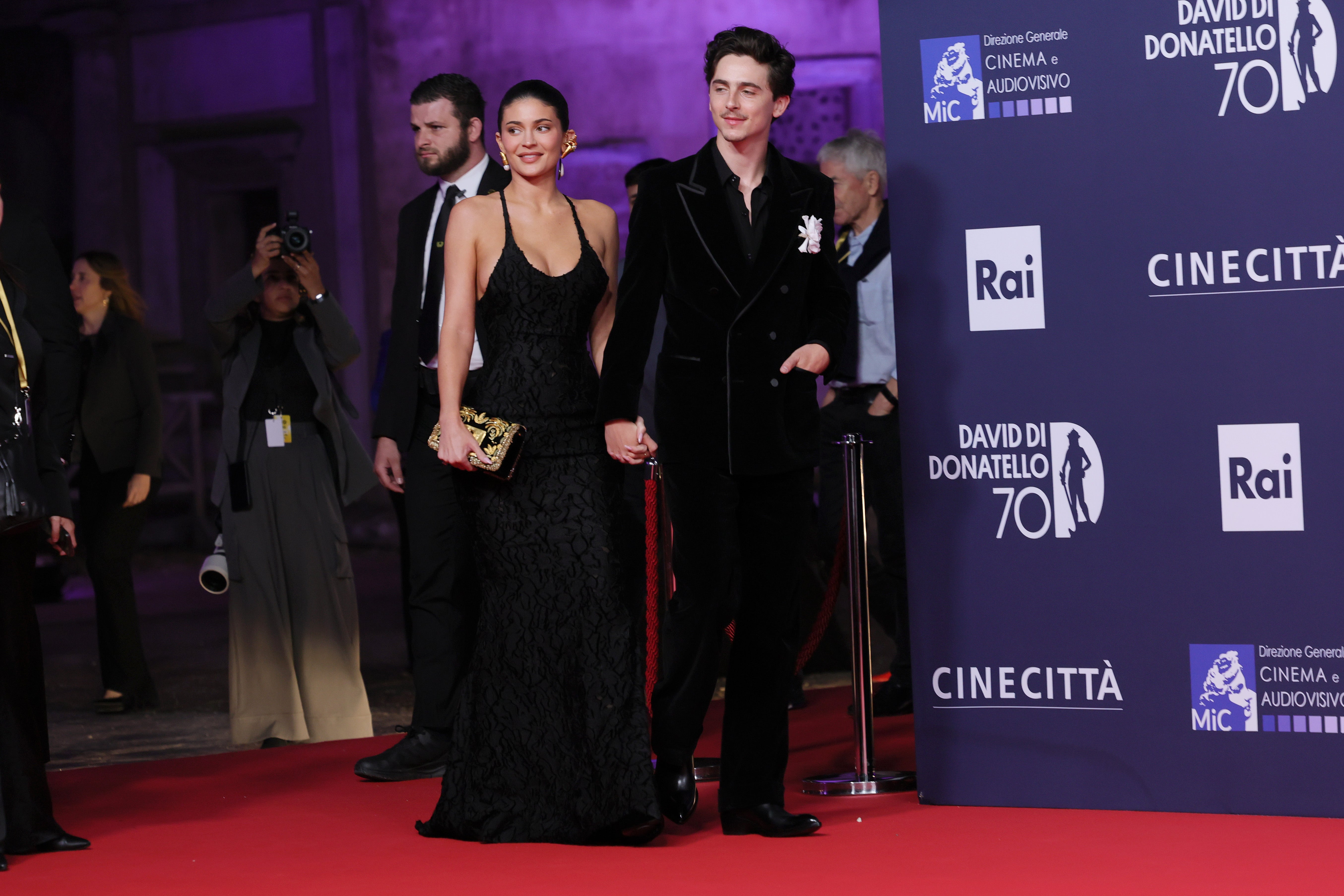 Jenner dressed in a low-cut, beaded black gown with a gold-hued clutch, while Chalamet wore a double-breasted, black velvet suit with a white rose brooch