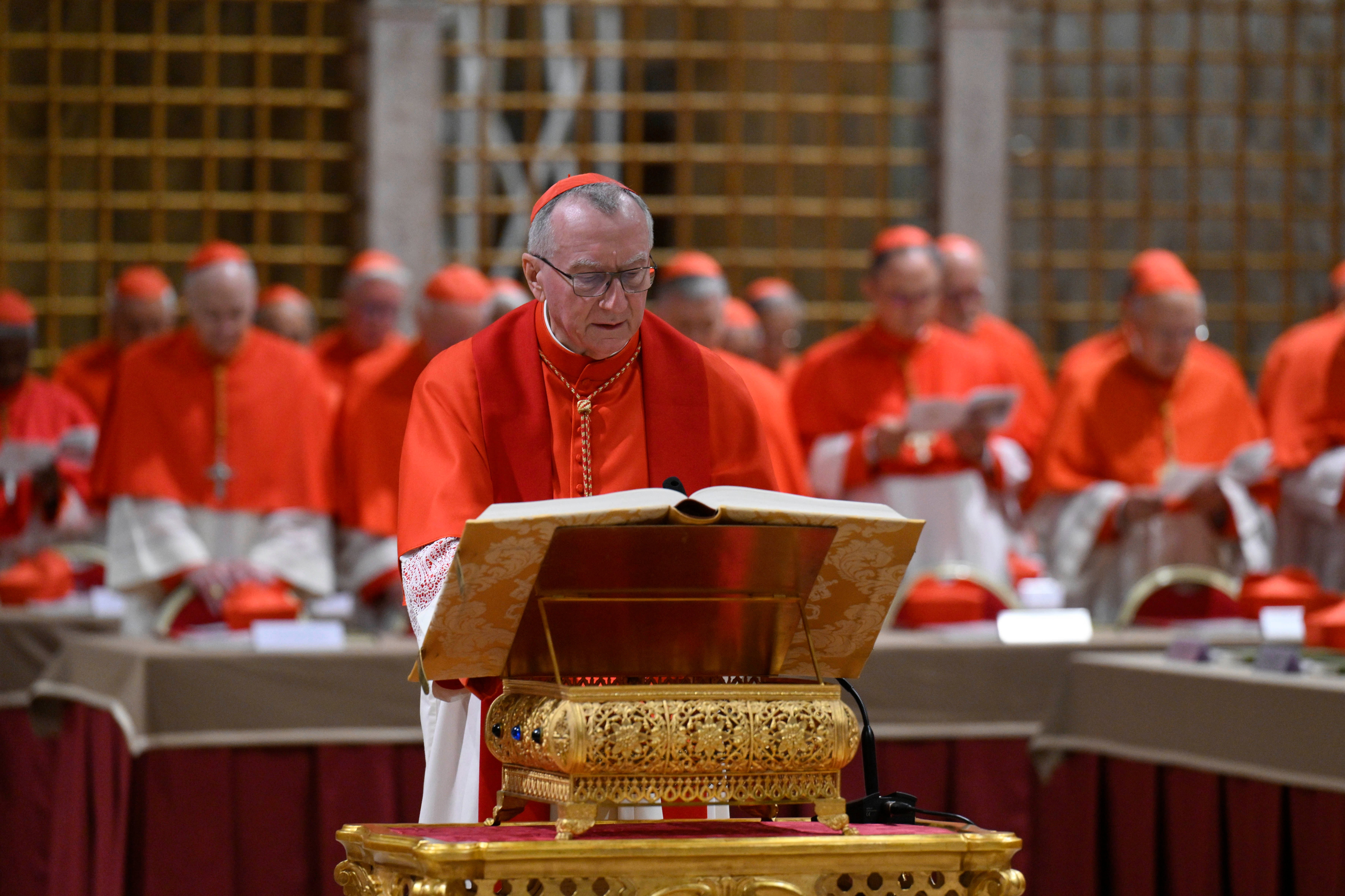 Cardinal Pietro Parolin takes the oath inside the Sistine Chapel at the Vatican at the start of the conclave to elect the successor of late Pope Francis