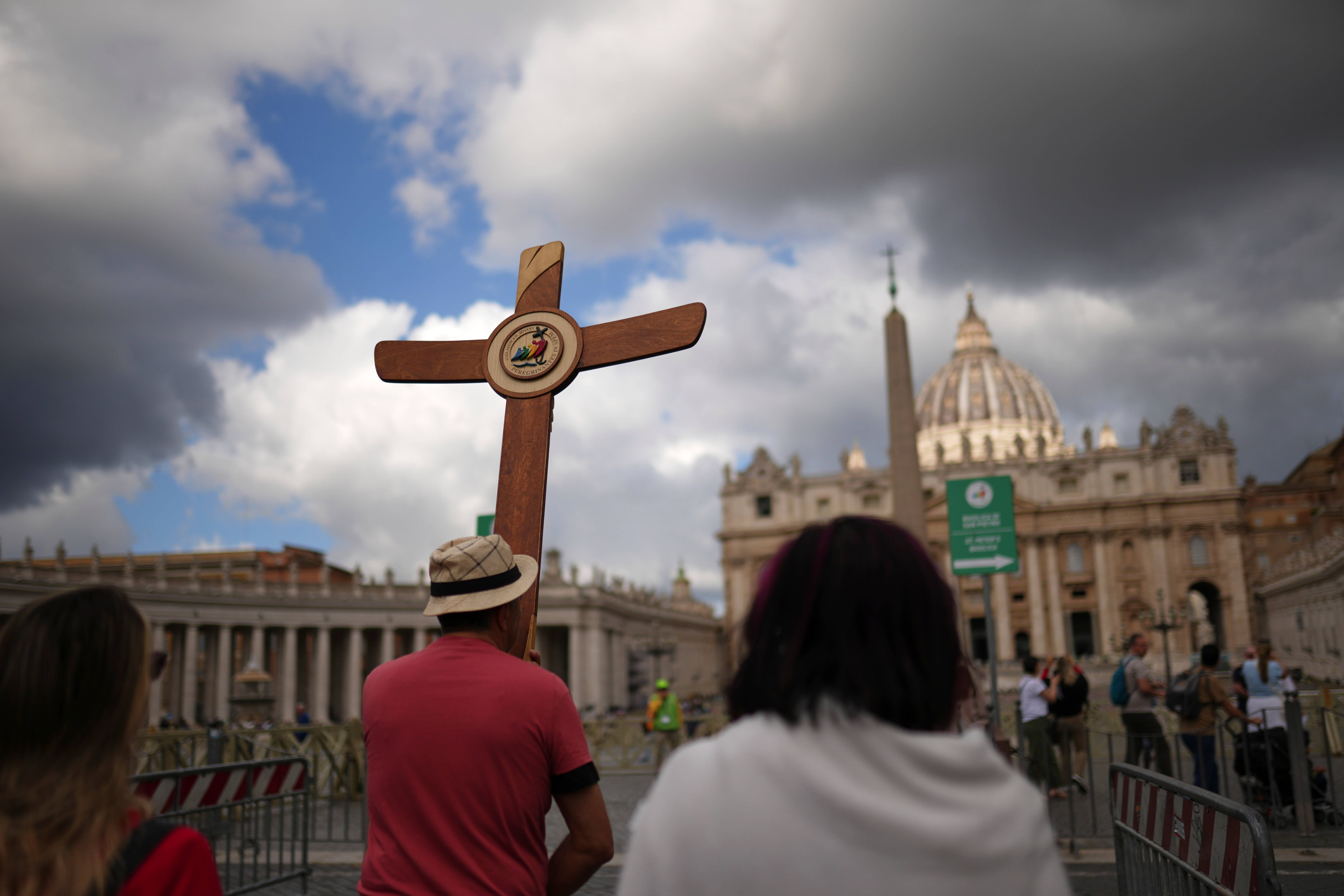 Crowds have gathered to await the smoke signals from the Sistine Chapel (Francisco Seco/AP)