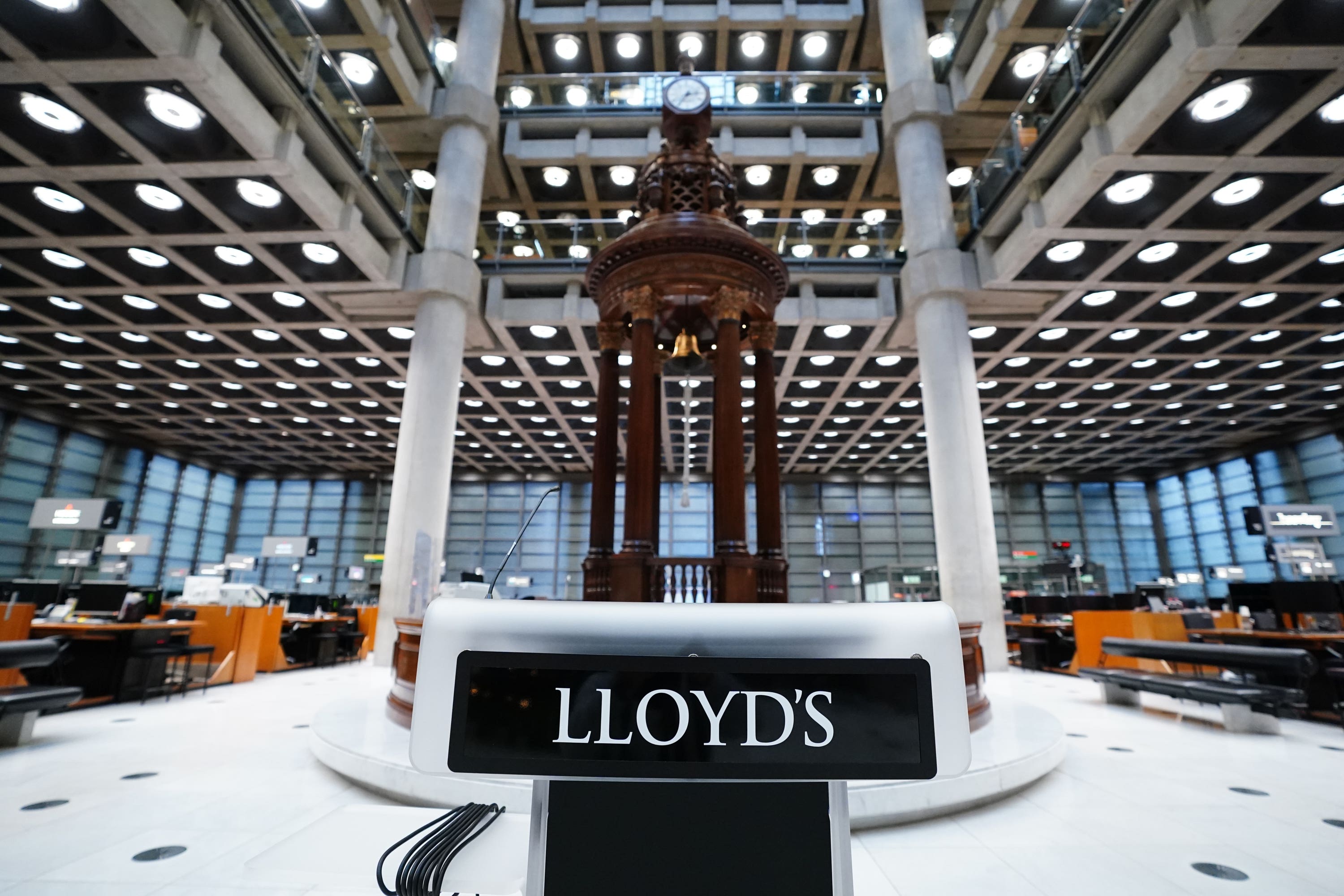 The Lutine Bell is housed on the underwriting floor of the Lloyd’s Building in London (Ian West/PA)