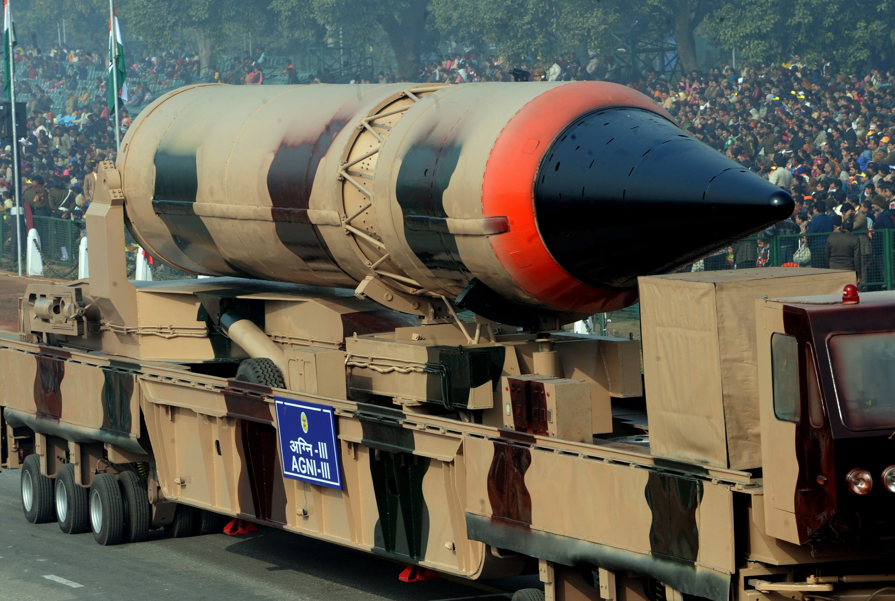 India's nuclear-capable Agni III missile rolls past during rehearsal for the Indian Republic Day parade