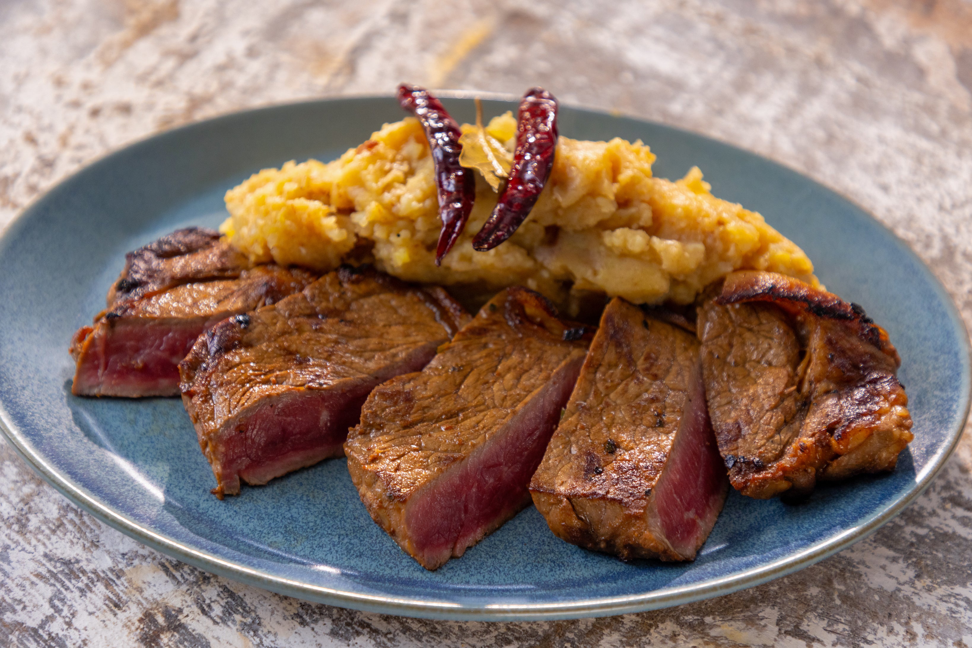 Inspired by Kolkata’s love of chilli and Chinese flavours, this fiery steak is finished with buttery mash infused with garlic and dried red chilli