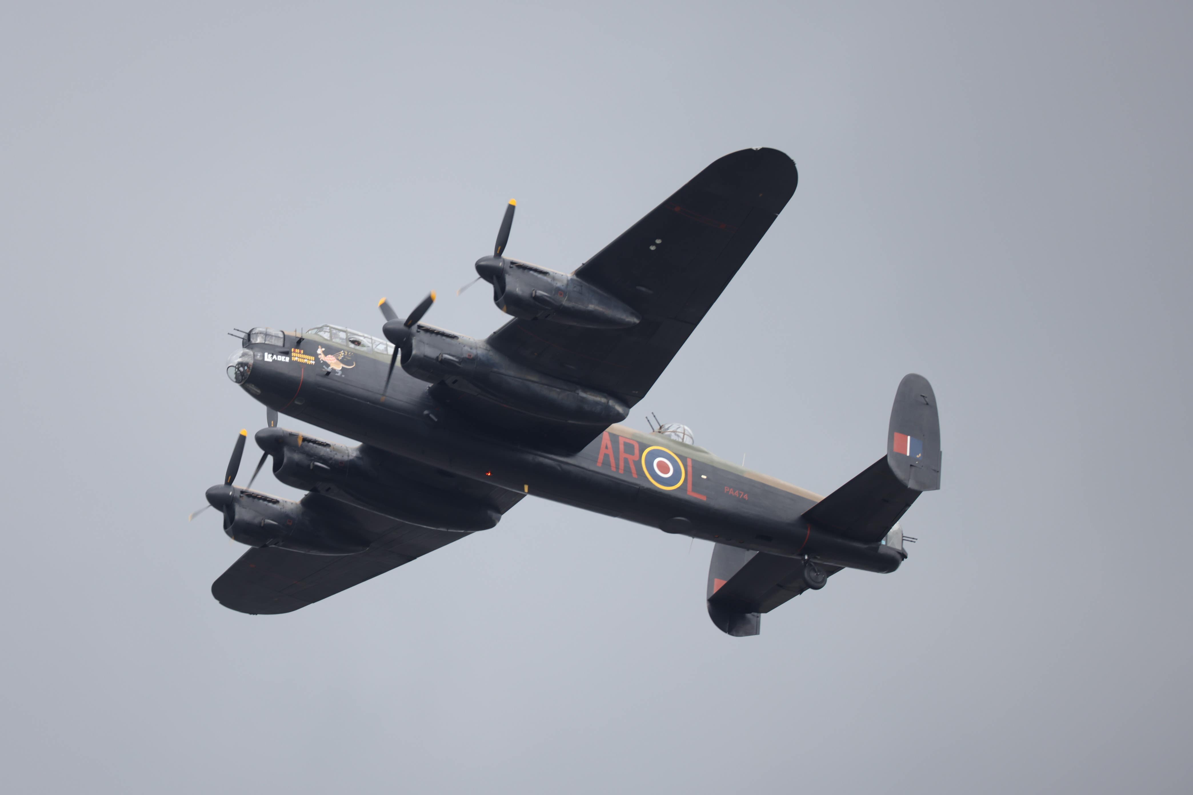 A Lancaster Bomber taking part in the flypast over Buckingham Palace (Sgt Grayson/PA)