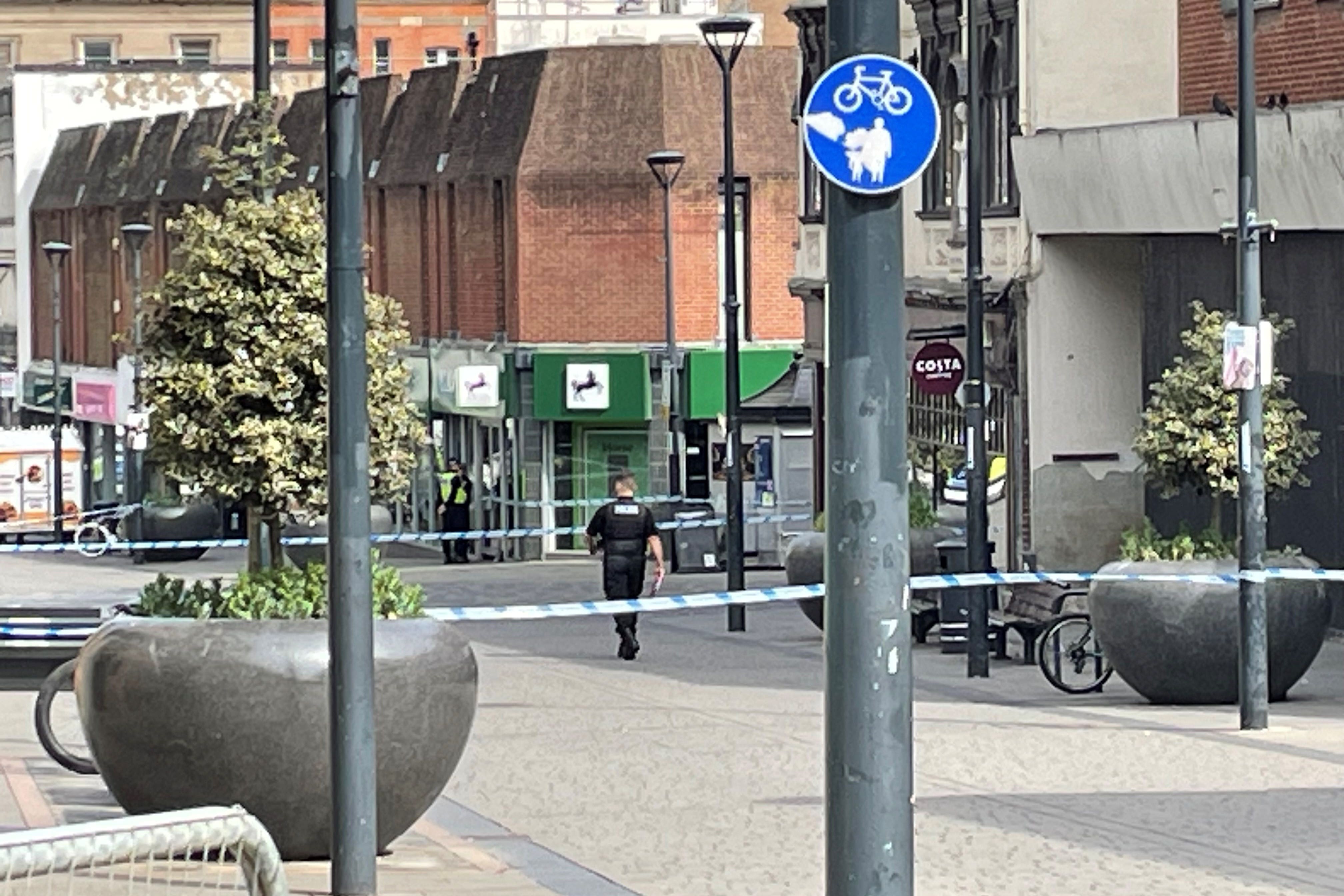 The scene in St Peter’s Street, Derby, as a murder inquiry continues into the fatal stabbing of a customer in a branch of Lloyds Bank on Tuesday afternoon (Matthew Cooper/PA)