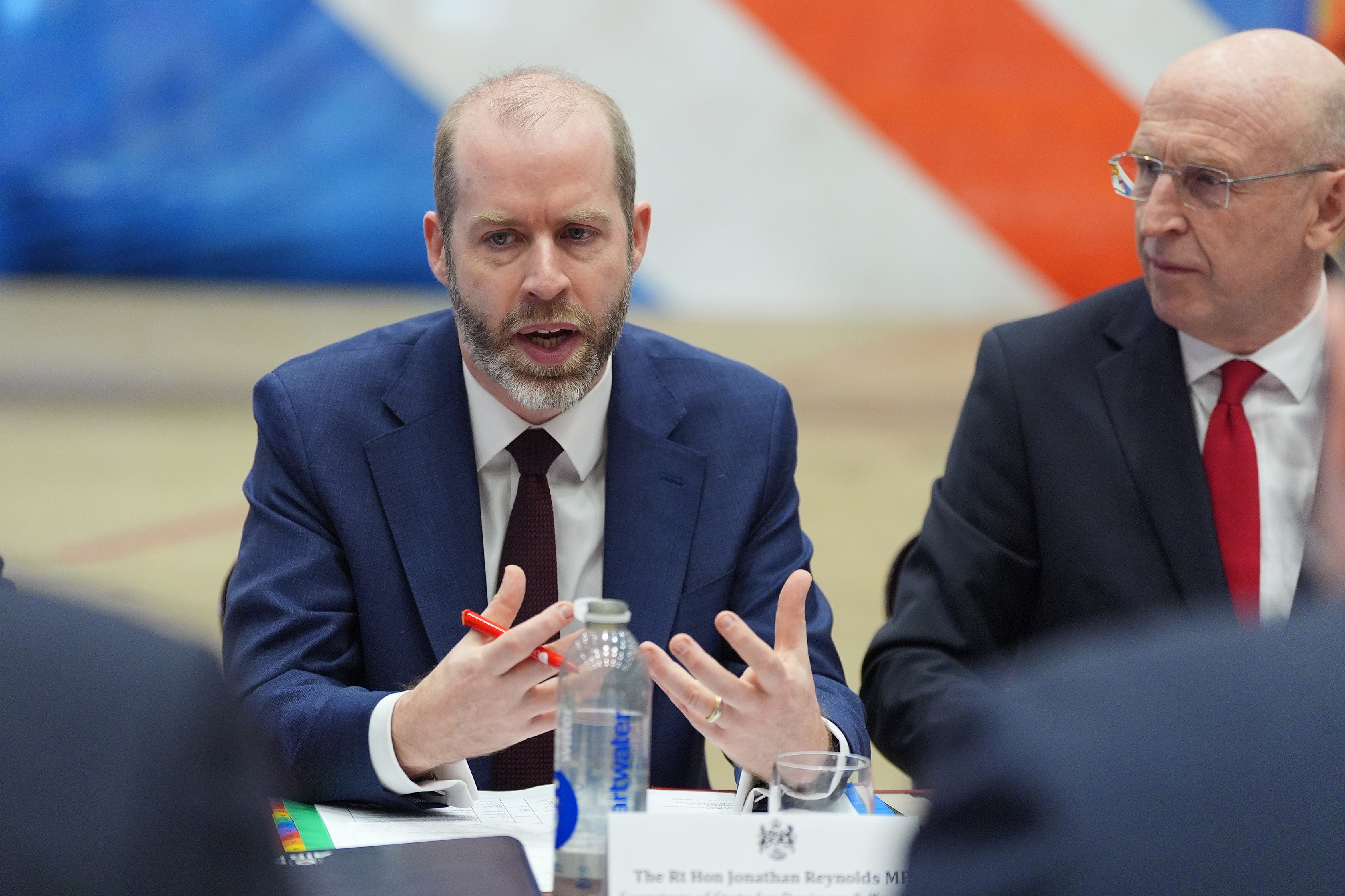 Business secretary Jonathan Reynolds, left, and defence secretary John Healye, right, have resisted calls to ban licences for the sale of F-35 parts