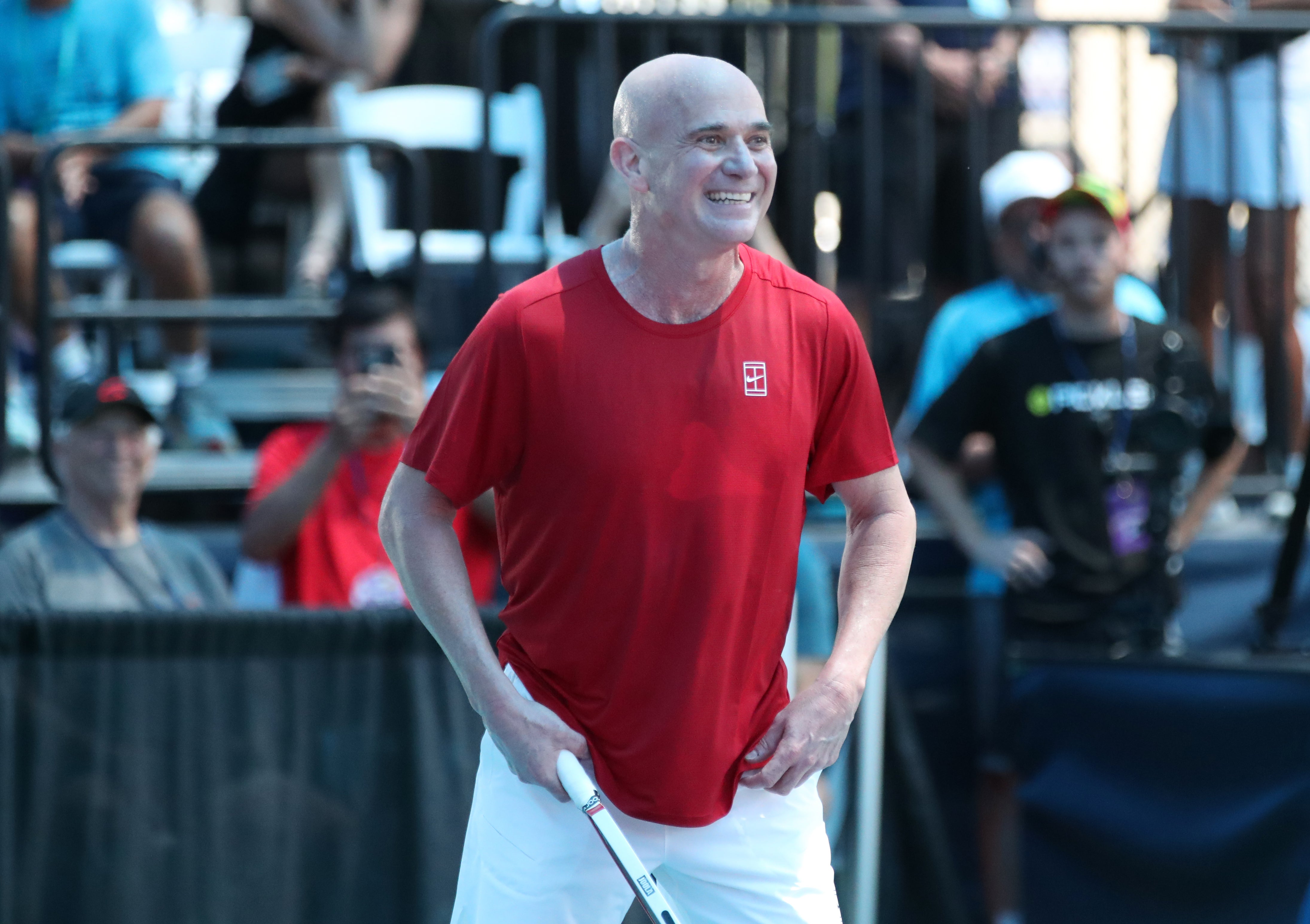 Andre Agassi smiles to the crowd at the 2025 US Open Pickleball Championships