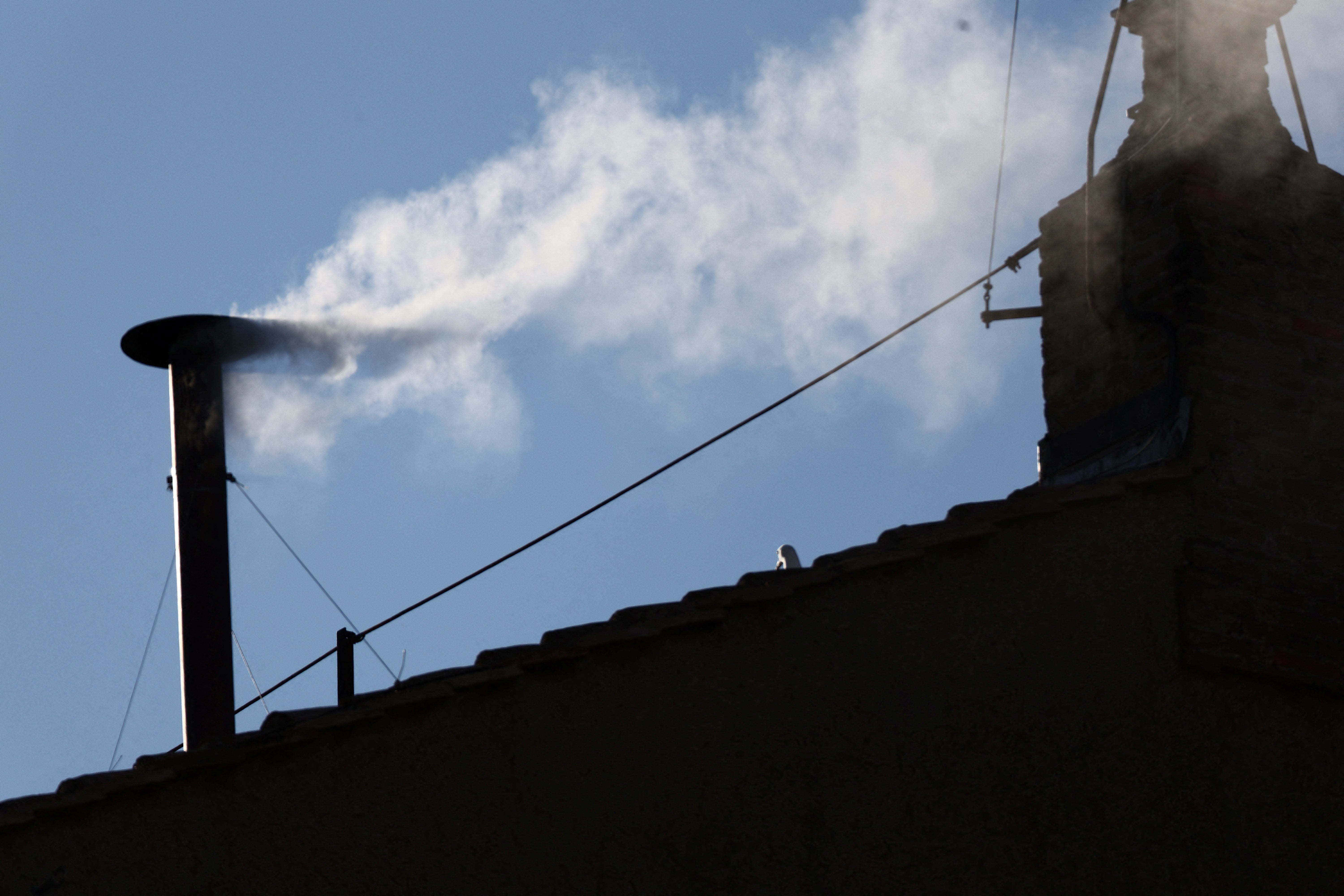 White smoke is seen coming from the chimney of the Sistine Chapel on May 8, indicating that a new Pope has been elected