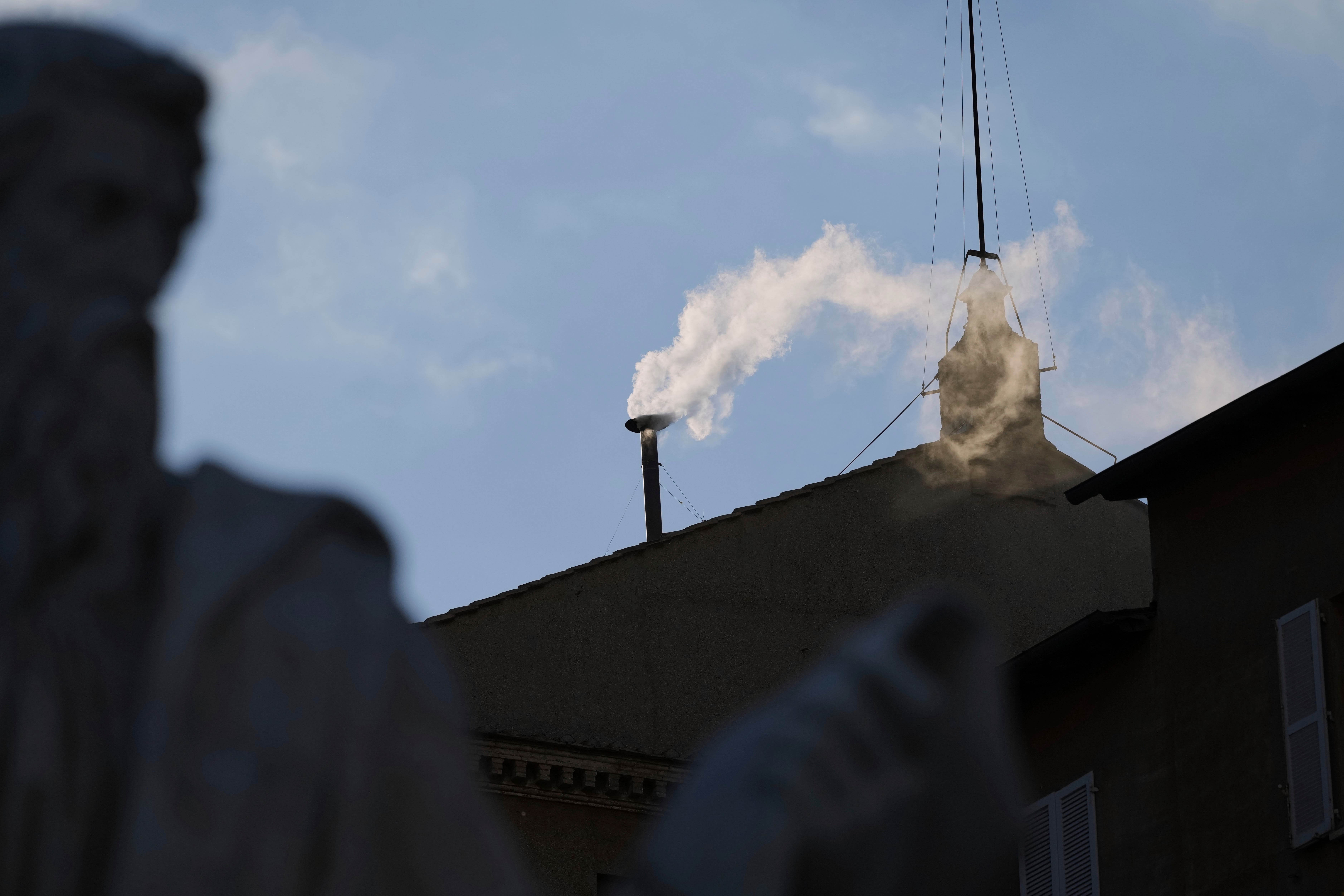 White smoke billows from the chimney of the Sistine Chapel (Alessandra Tarantino/AP)