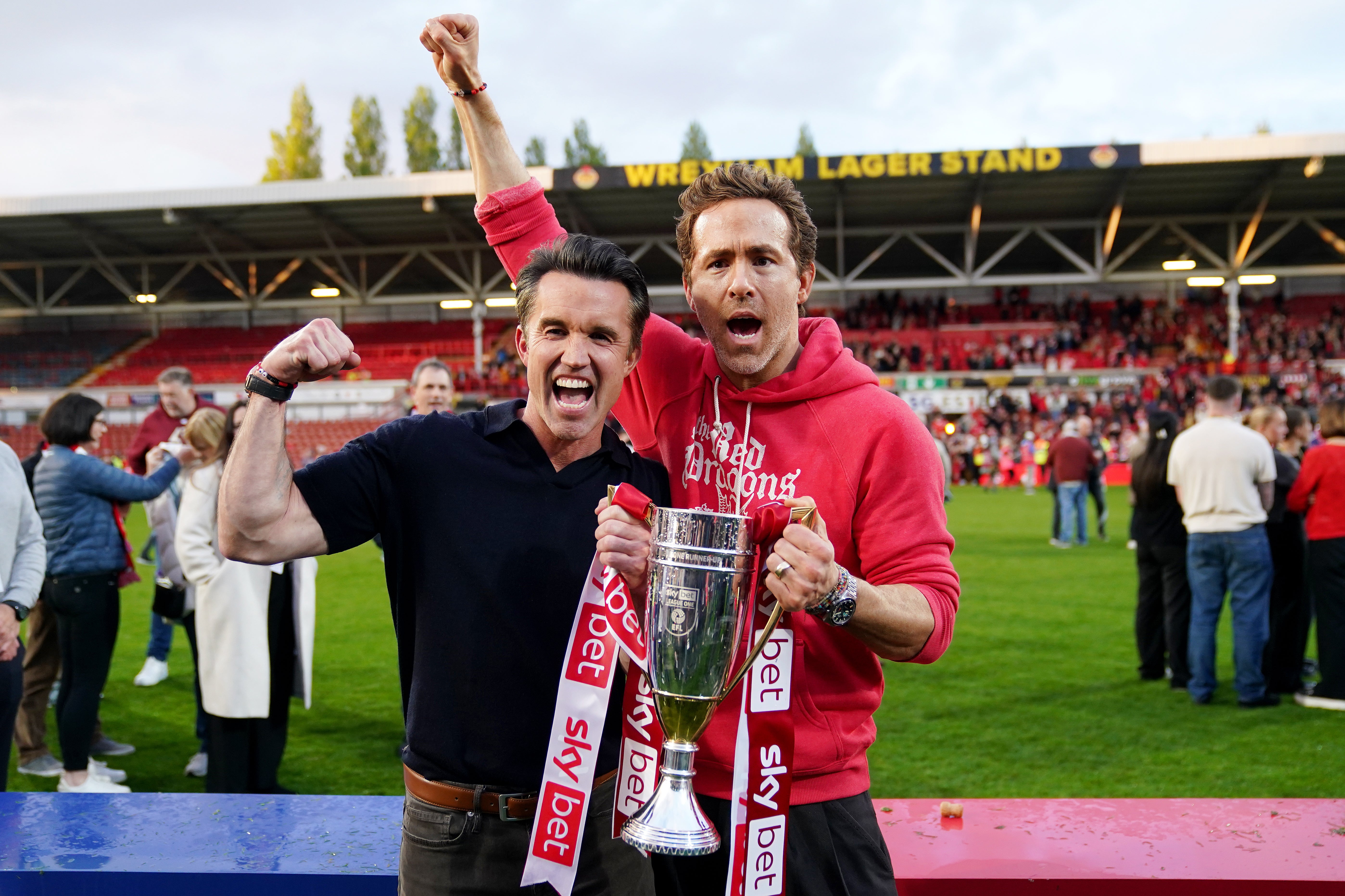 Wrexham co-owners Ryan Reynolds (right) and Rob McElhenney (left) celebrate their promotion to the Championship