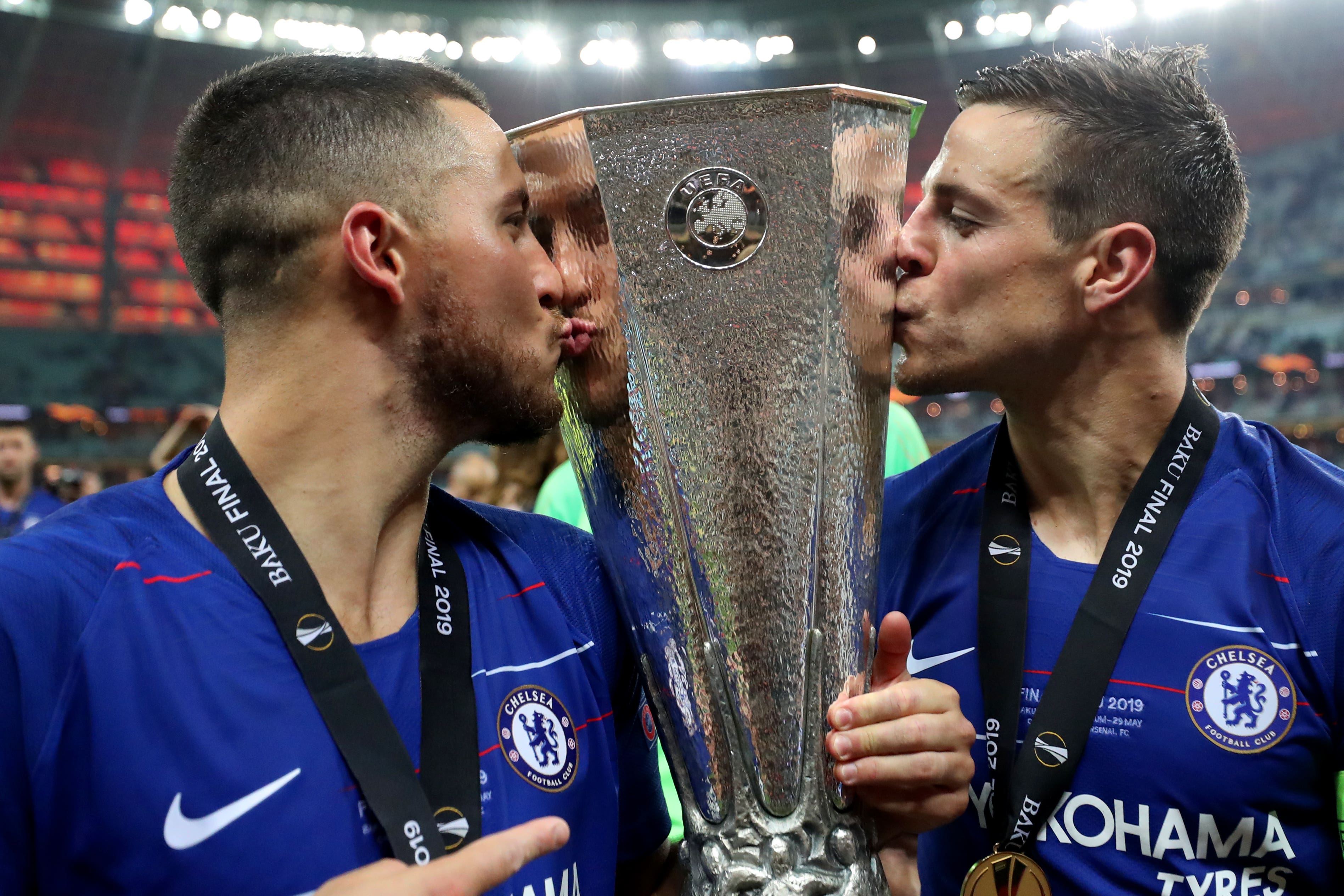 Chelsea’s Eden Hazard (left) and Cesar Azpilicueta kiss the Europa League trophy (Bradley Collyer/PA)