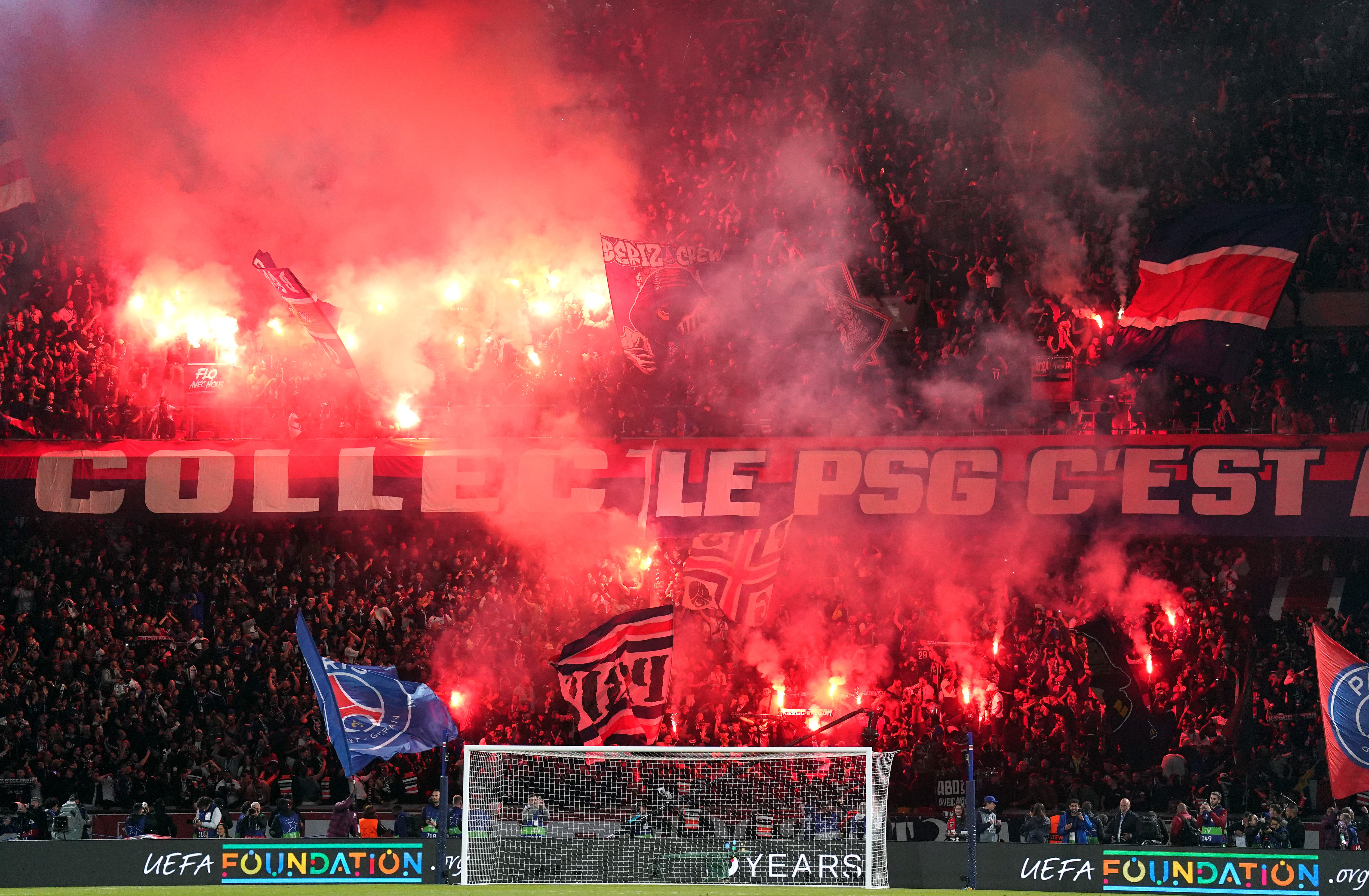 Paris Saint-Germain fans celebrate victory with flares