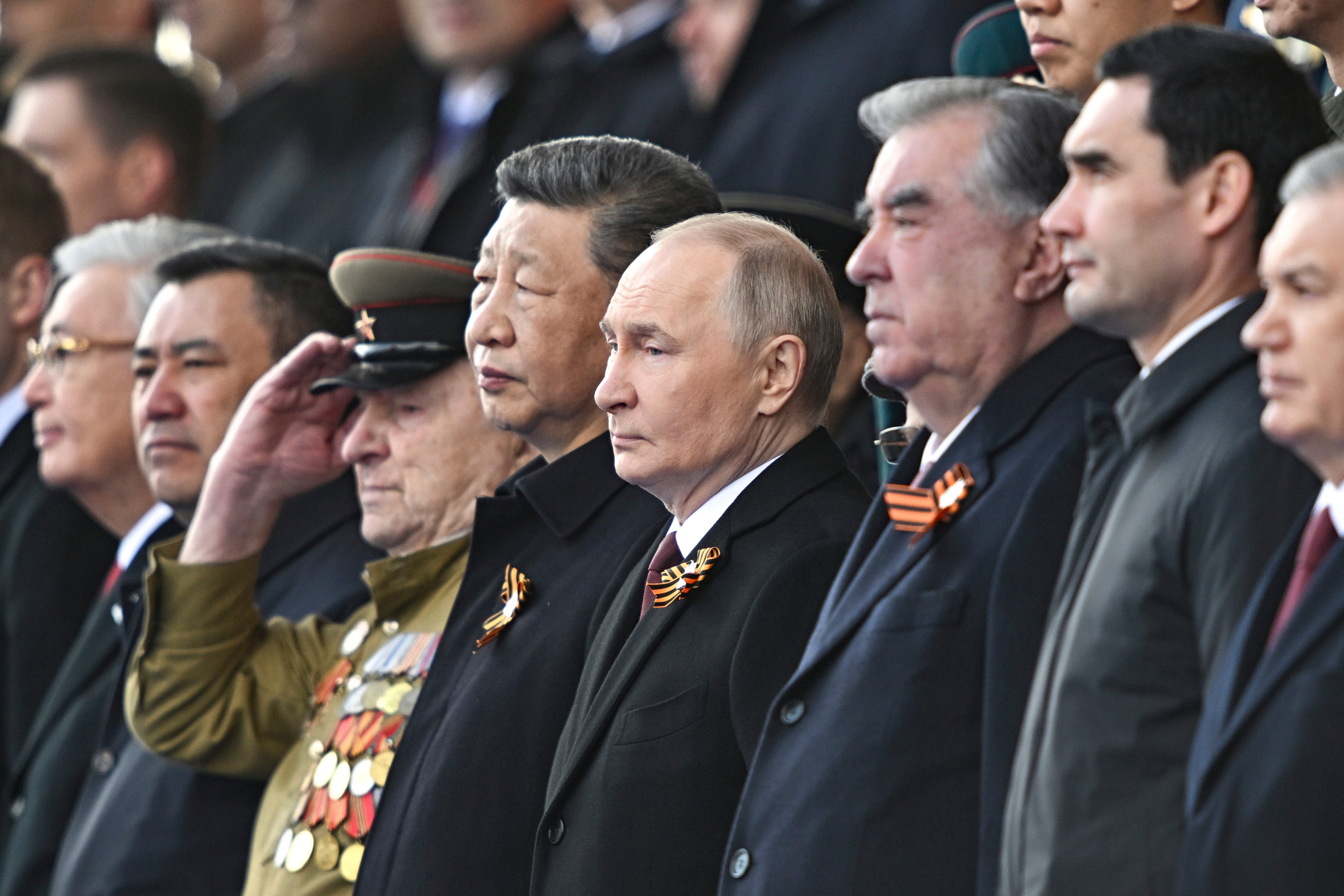 Twenty-nine heads of state and government were on the podium with Putin