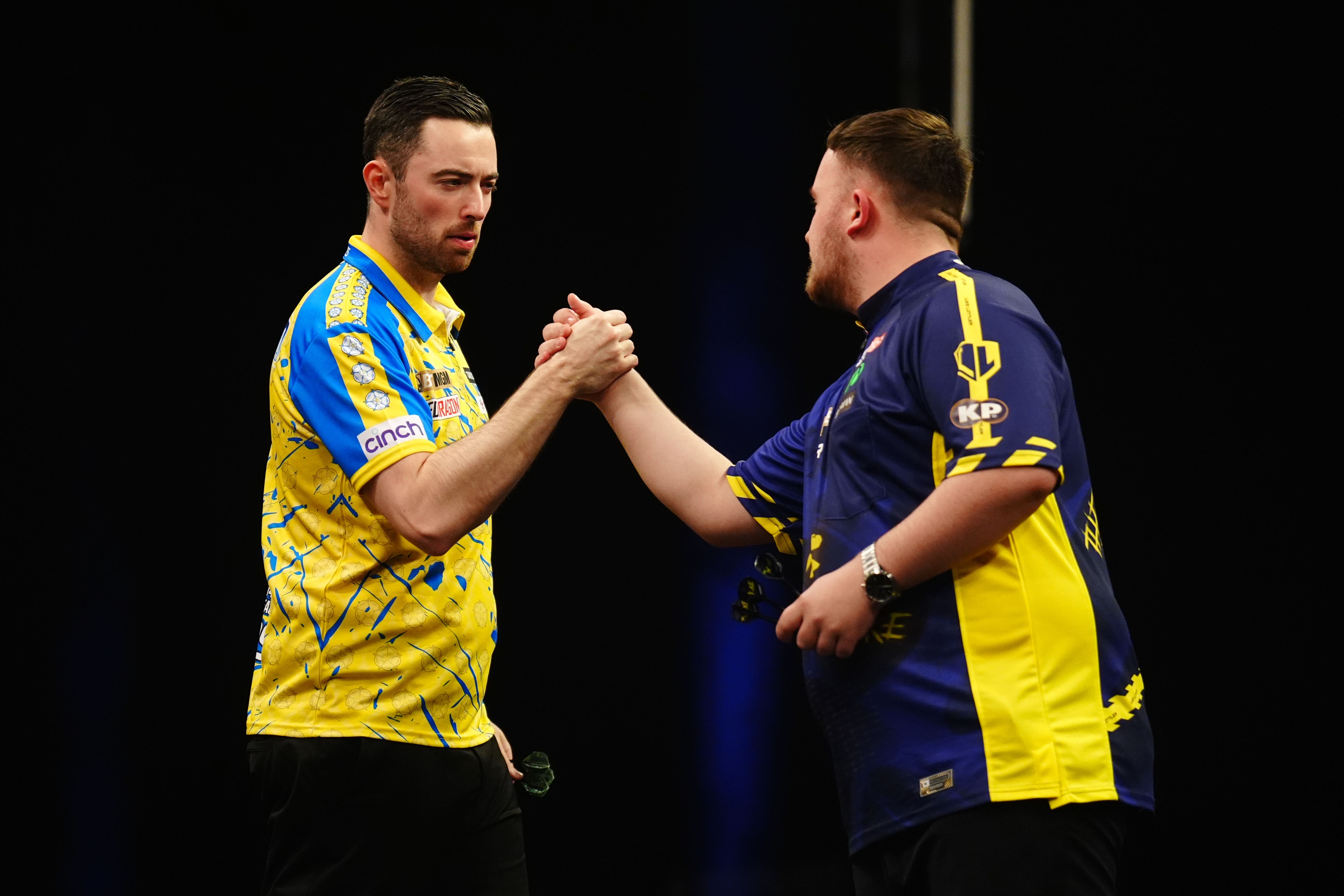 Luke Humphries says his rivalry with Luke Littler, right, is not boring (Mike Egerton/PA)