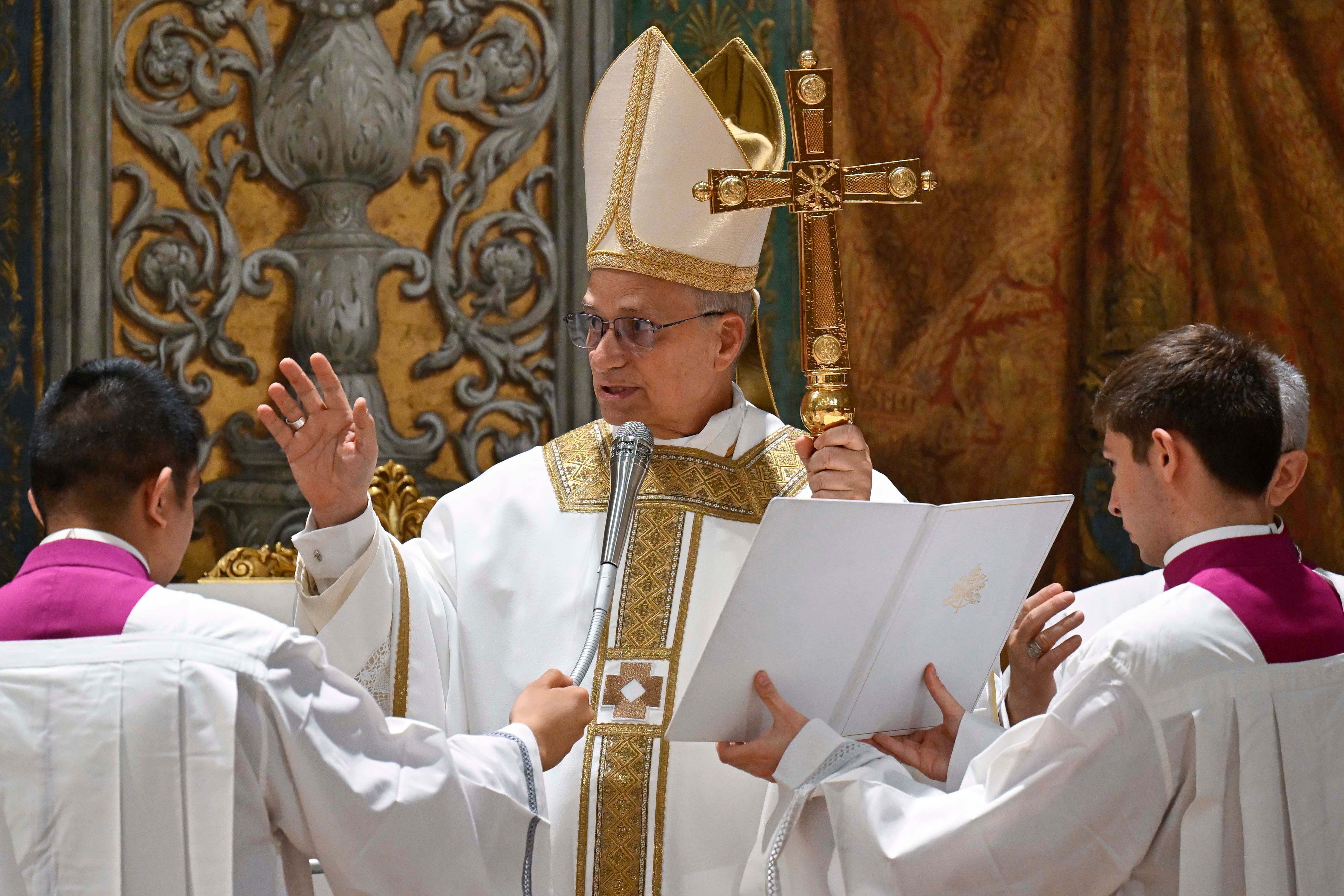 Newly elected Pope Leo XIV celebrates Mass with the College of Cardinals inside the Sistine Chapel at the Vatican the day after his election (Vatican Media via AP)