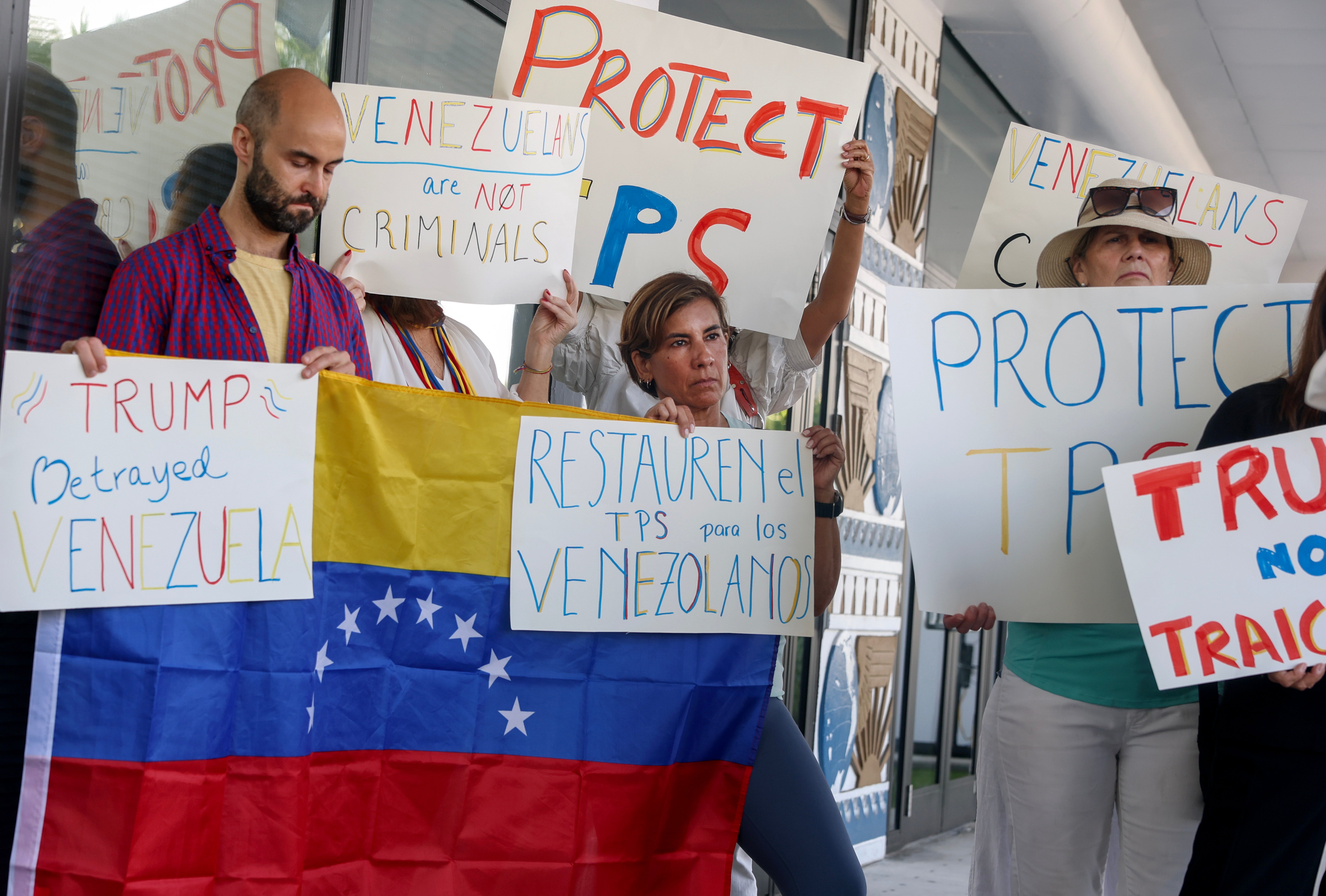Demonstrators in Miami protest Trump's decision to revoke temporary protected status for thousands of Venezuelans who fled the country and immigrated to the United States