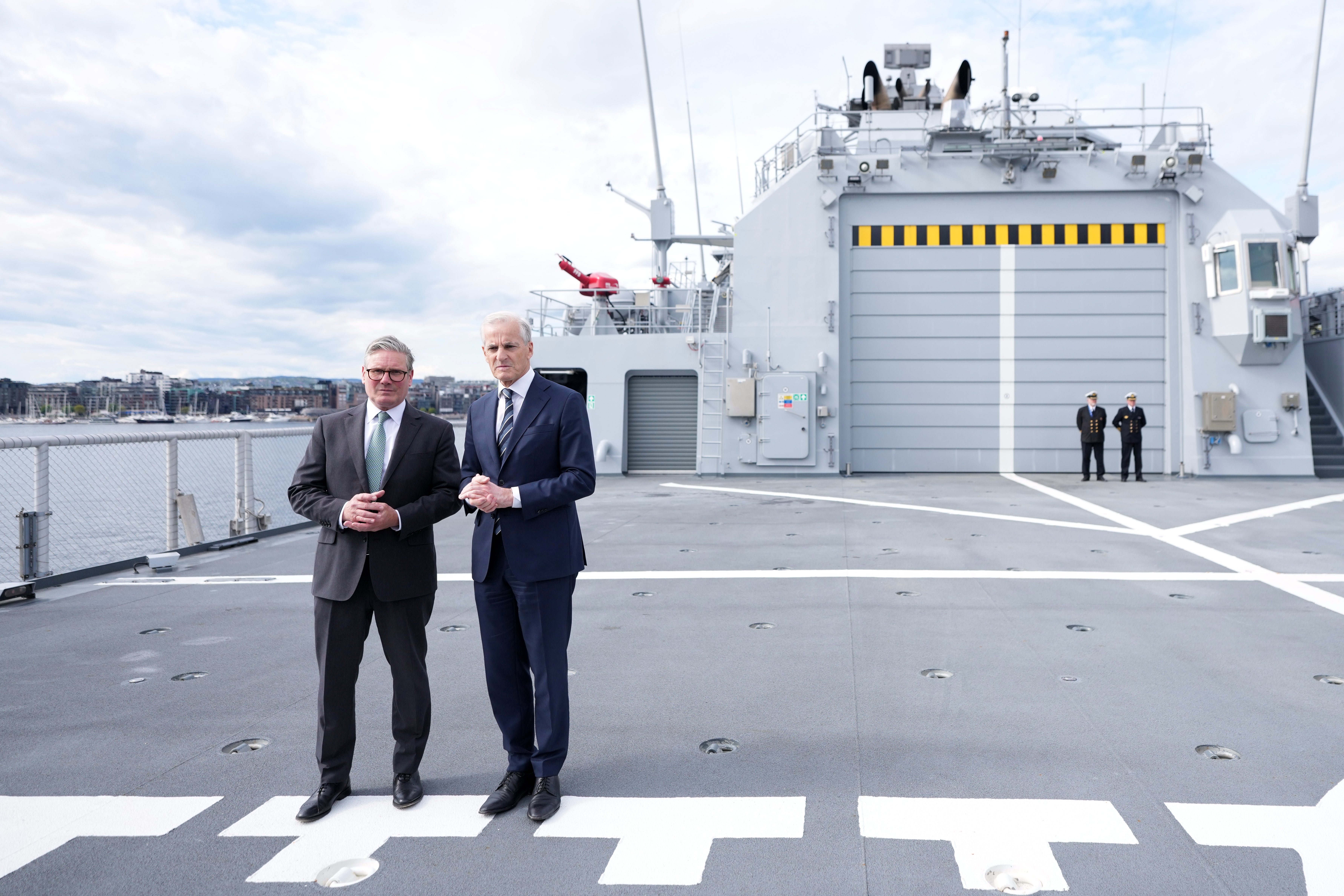 Sir Keir Starmer (left) meets Norwegian Prime Minister Jonas Gahr Store on the Norwegian coastguard vessel Jan Mayen in Oslo (Alistair Grant/PA)