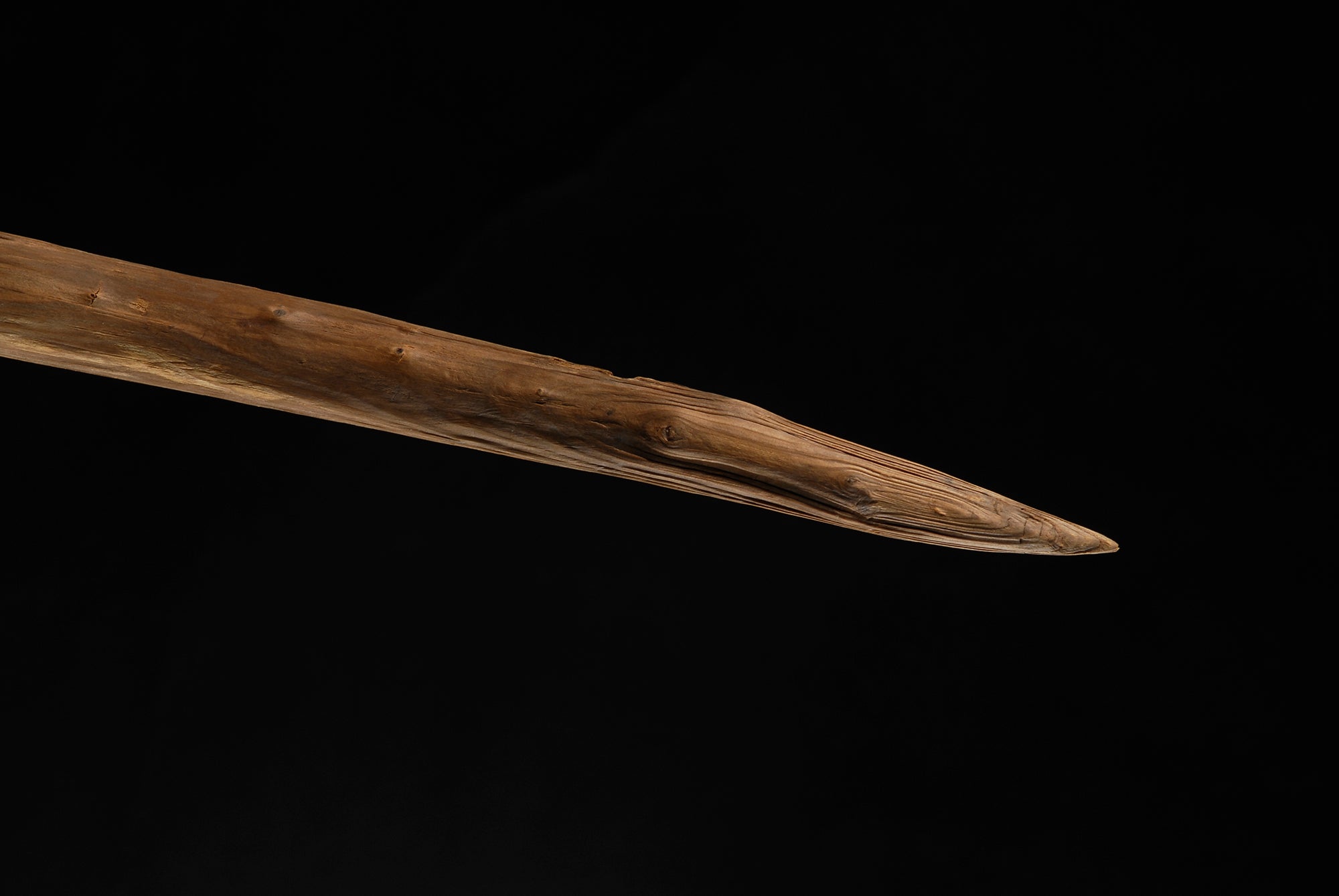 This 2007 photo provided by researchers shows the end of a wooden hunting spear estimated to be about 200,000 years old discovered in a coal mine in the German town of Schöningen. (C. S. Fuchs/Niedersächsisches Landesamt für Denkmalpflege via AP)