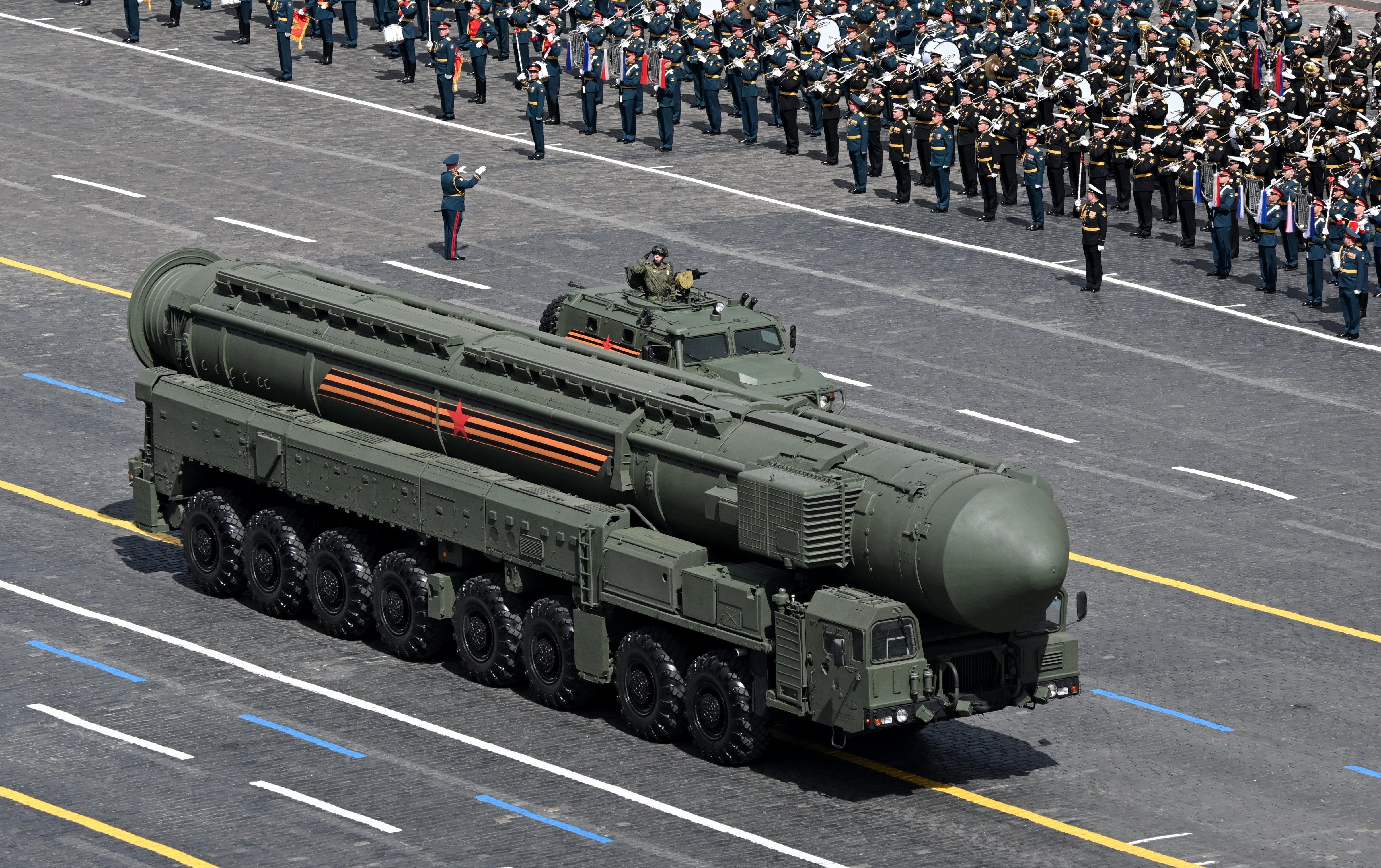 Huge Yars nuclear-tipped intercontinental ballistic missiles launchers rolled across Red Square