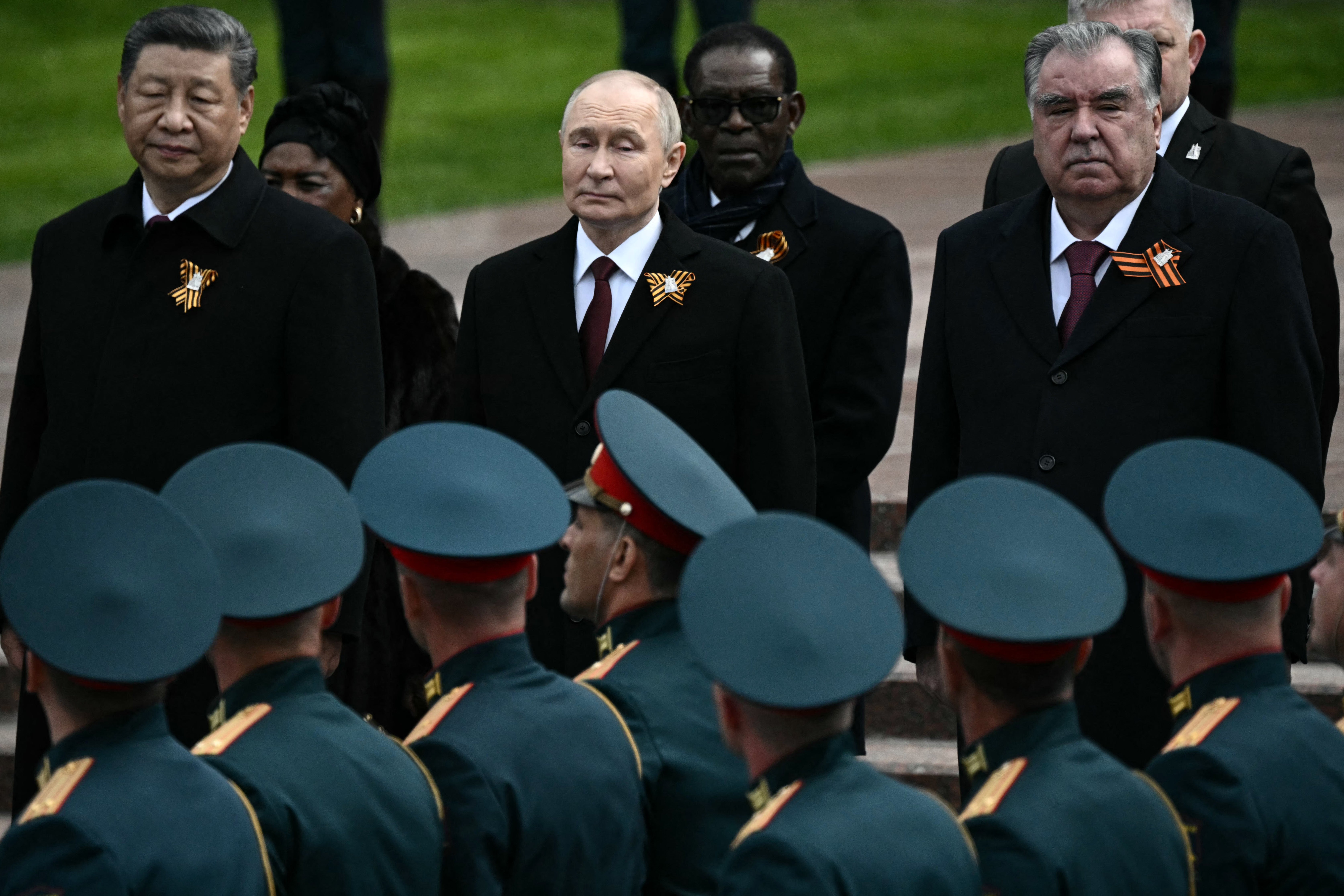 Putin and Xi inspect troops during the Moscow parade