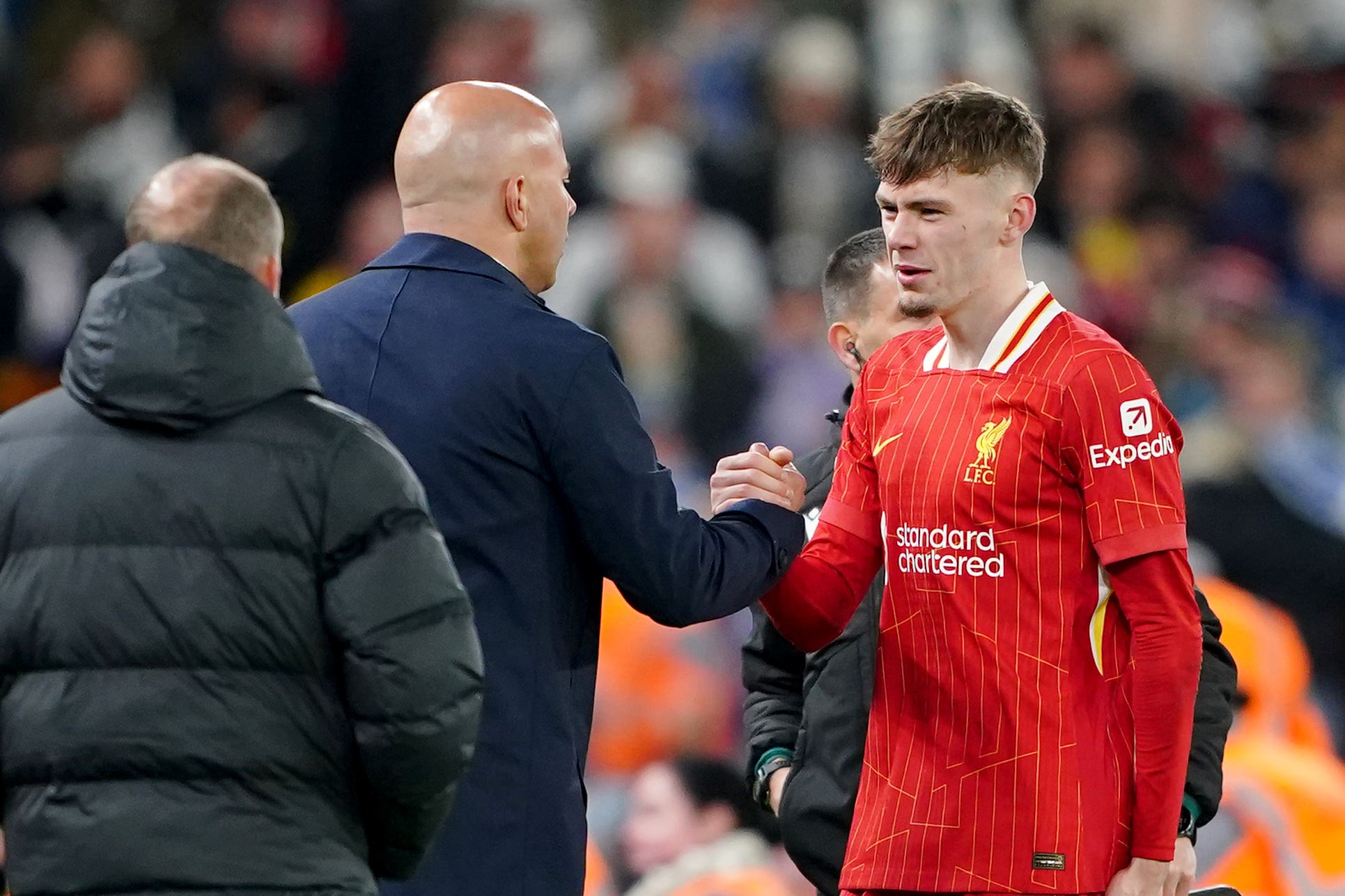 Arne Slot (left) is keen to avoid comparing Liverpool’s Conor Bradley (right) to tret Alexander-Arnold (Peter Byrne/PA)