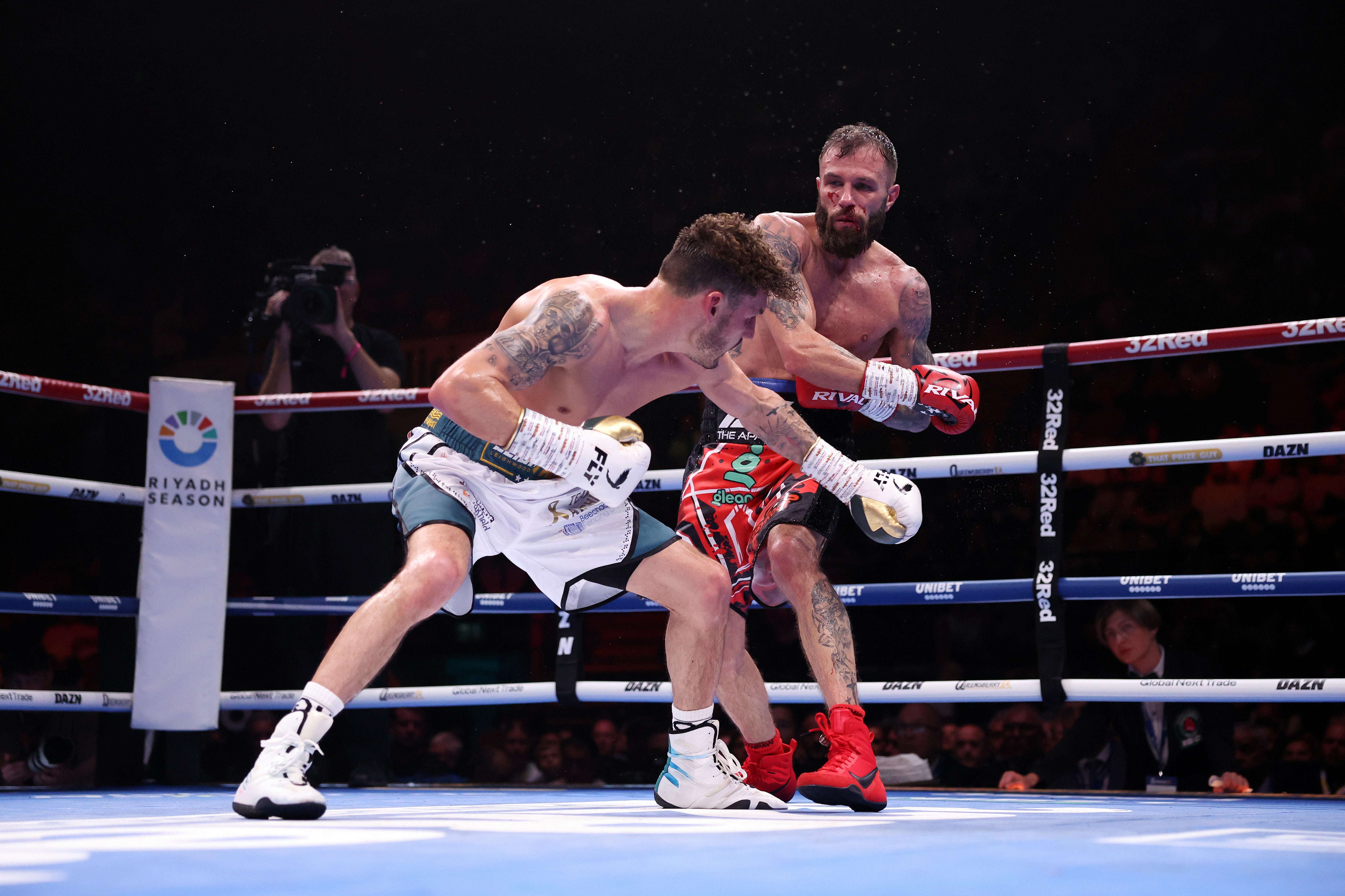 Anthony Cacace (right) hurt Leigh Wood badly in the ninth round