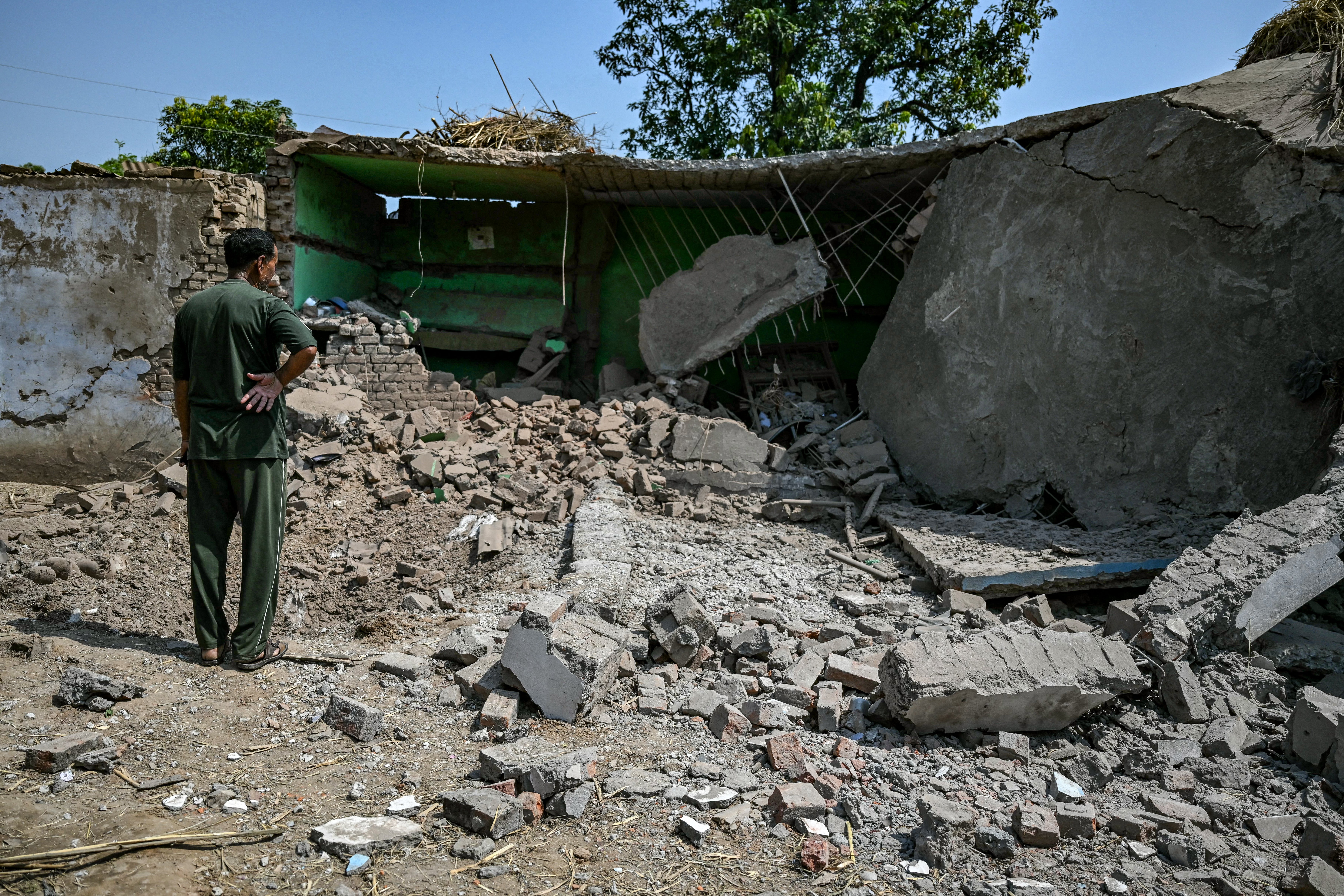 A house damaged by Pakistani artillery shelling in Kotmaira village
