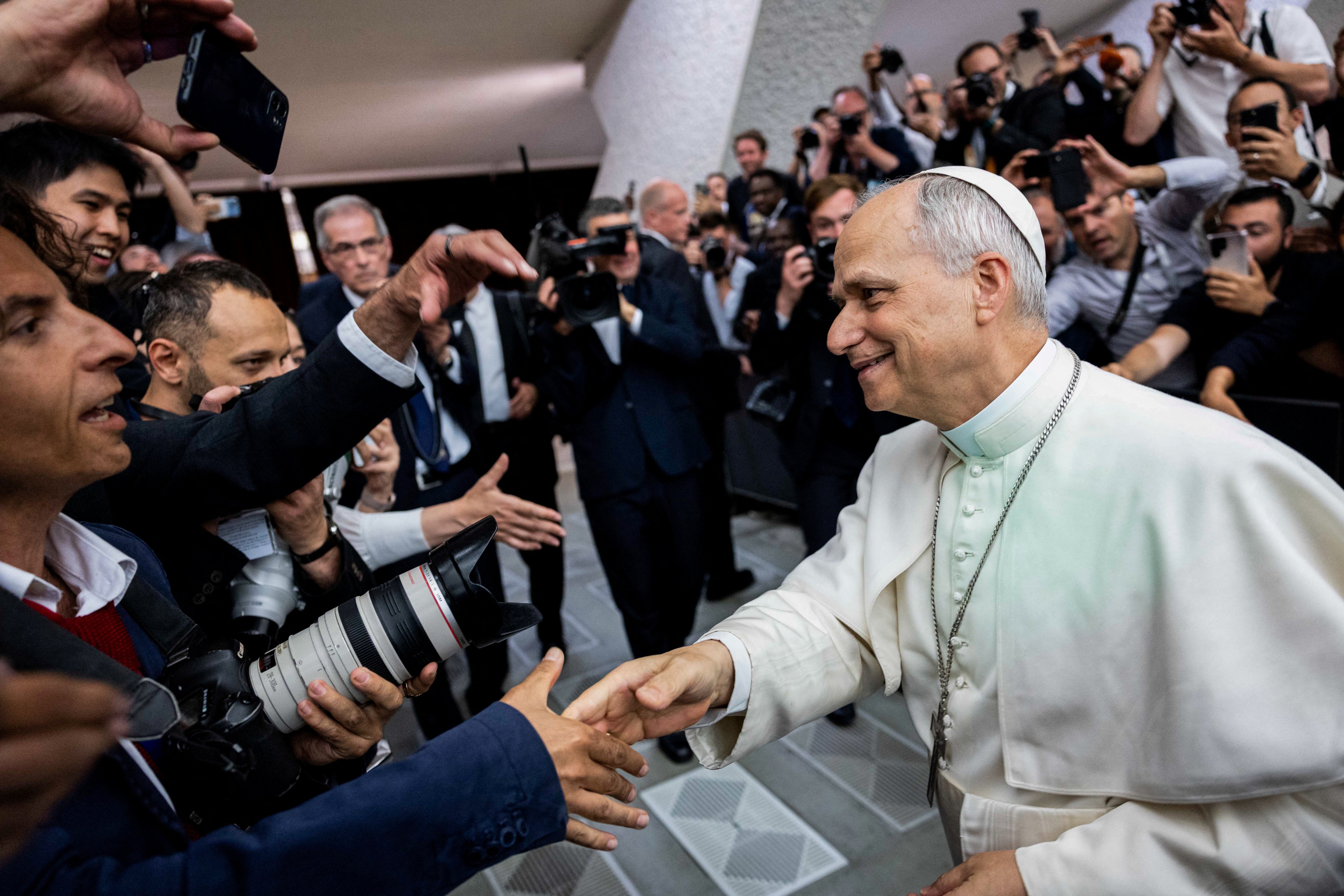 The pontiff met with crowds after his address, shaking hands and speaking with attendees one-by-one