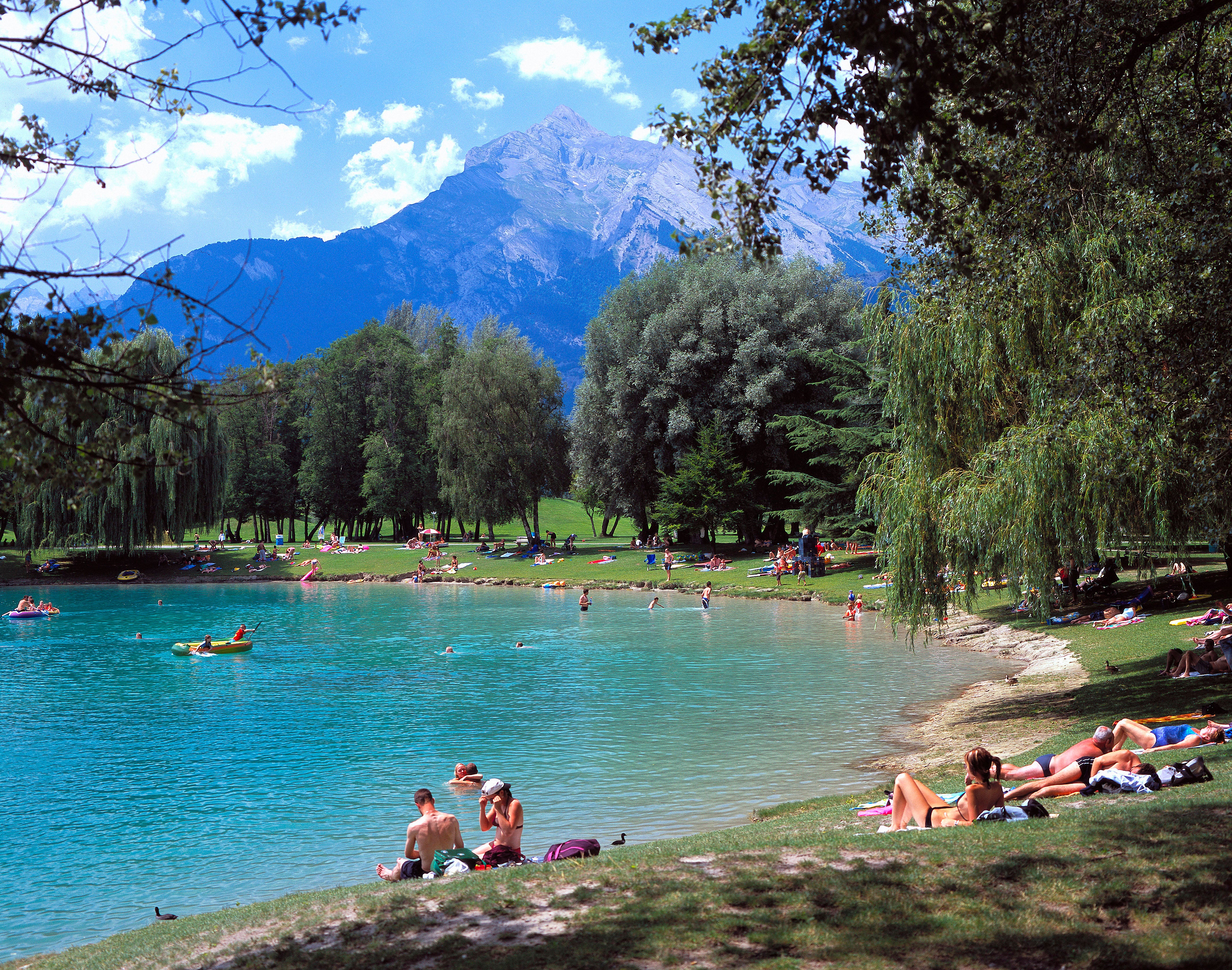 Switzerland Europe canton Valais Sion Les Iles bath lake sea bathing person Alps mountains camping (Alamy/PA)