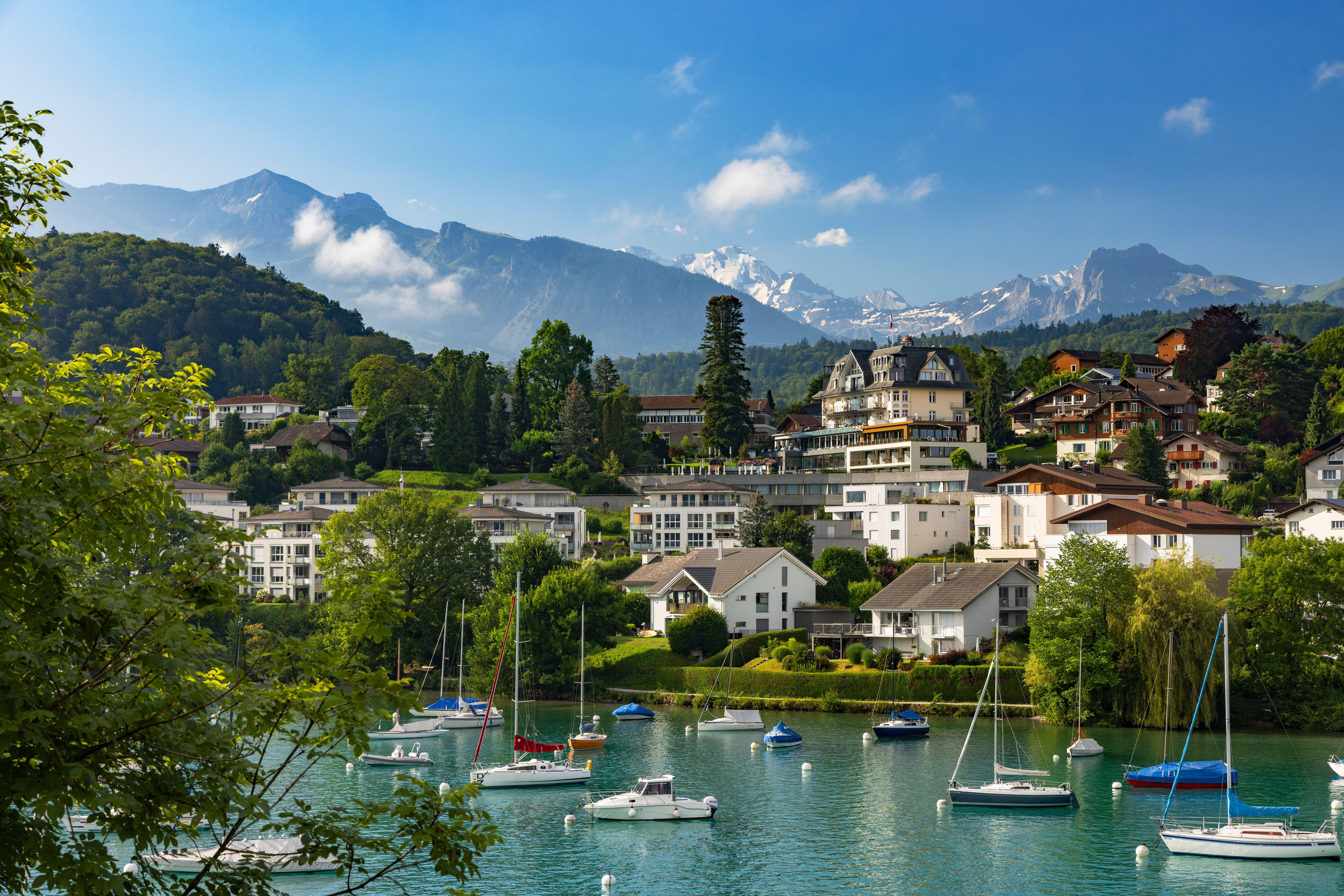 Boats in harbour, Spiez, Canton of Bern, Switzerland (Alamy/PA)