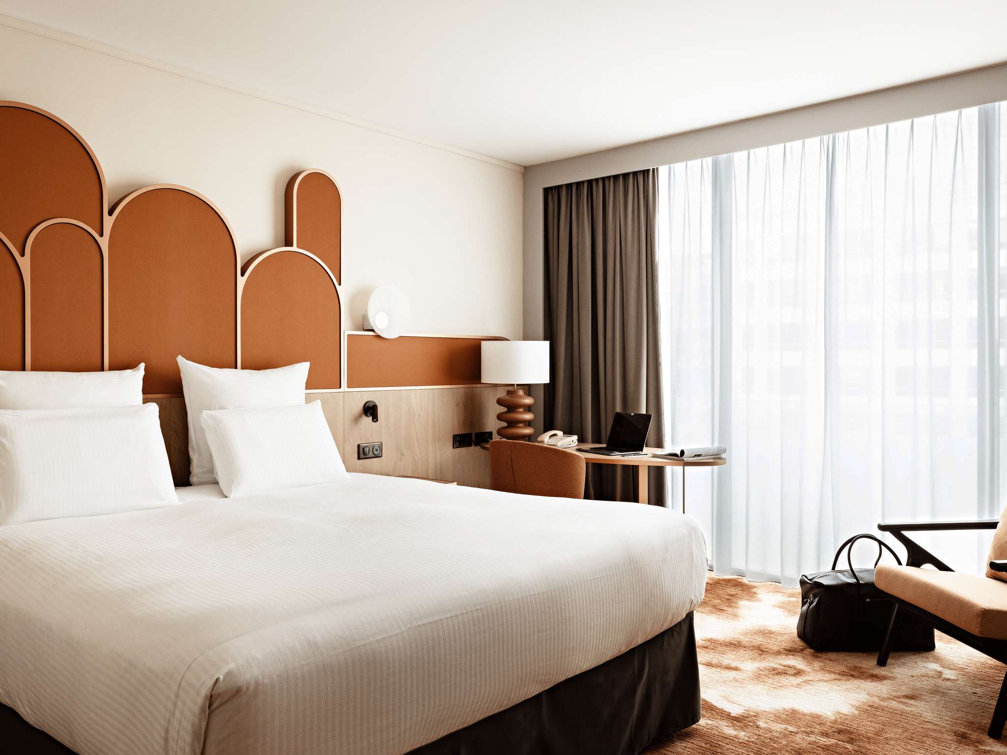 Rooms can sleep up to six people at Pullman Paris Centre-Bercy