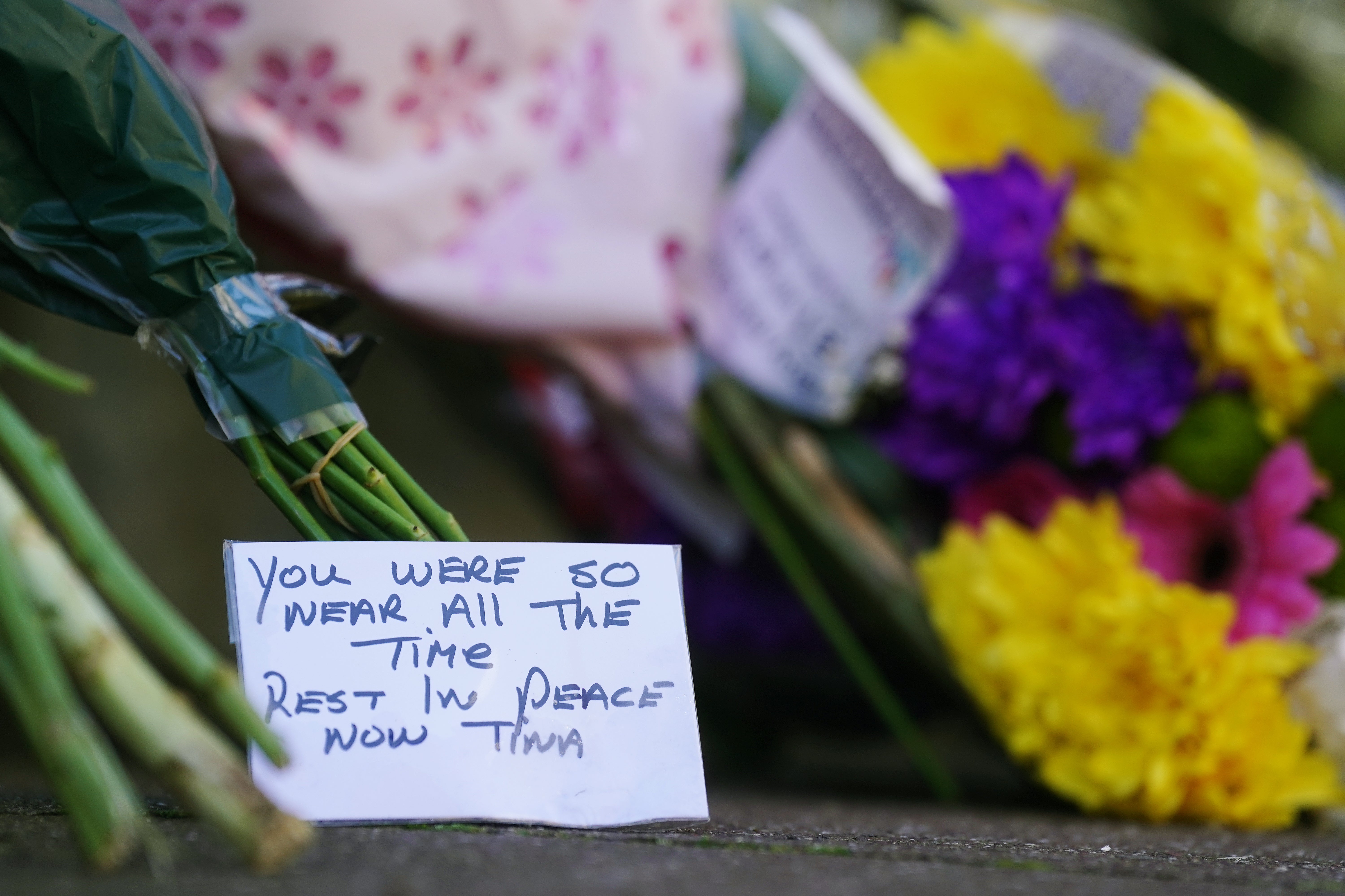 Flowers and messages left near to the scene in Youghal, Co Cork, where Tina Satchwell’s remains were discovered