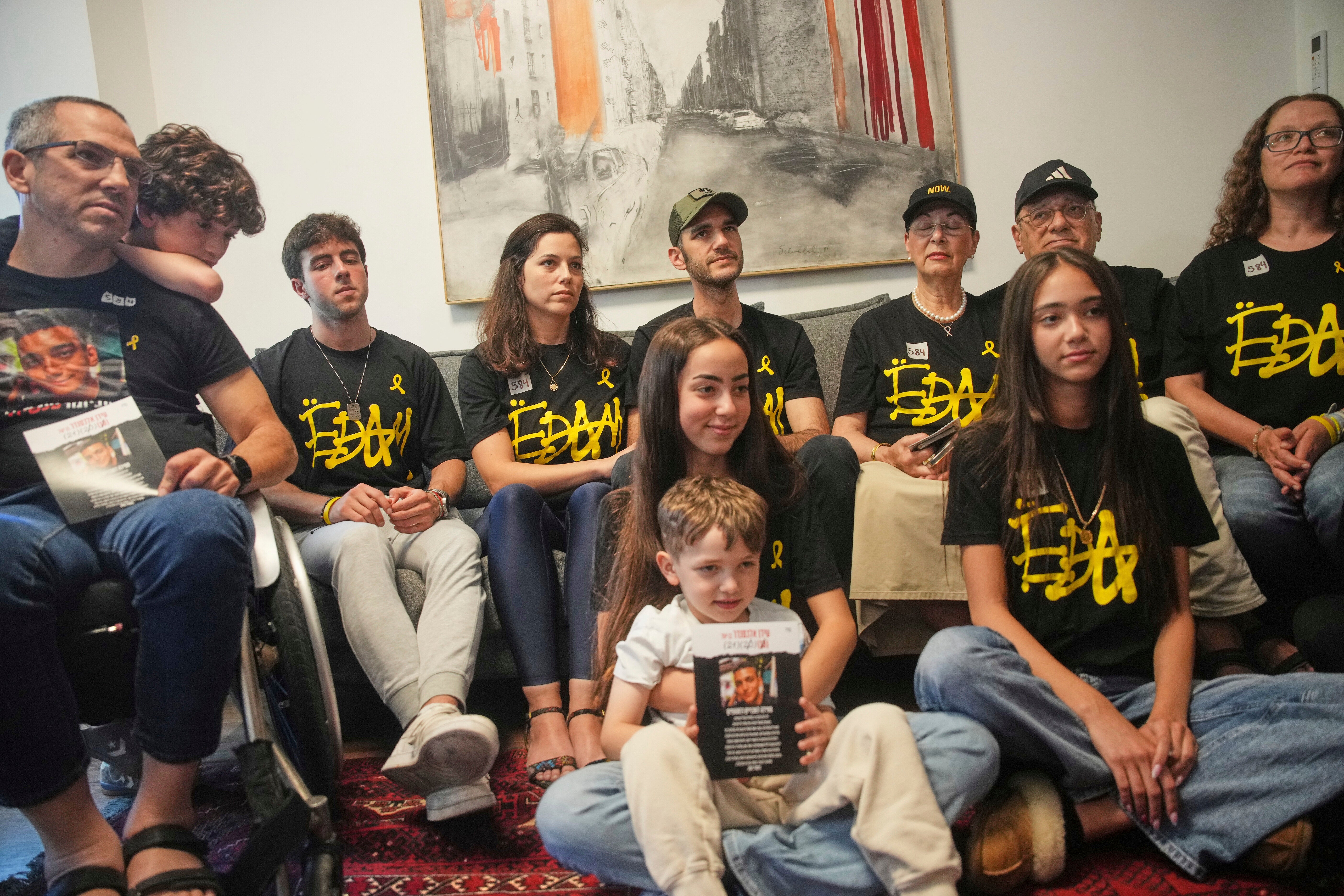 Relatives and friends of Israeli-American soldier Edan Alexander gather to watch his release
