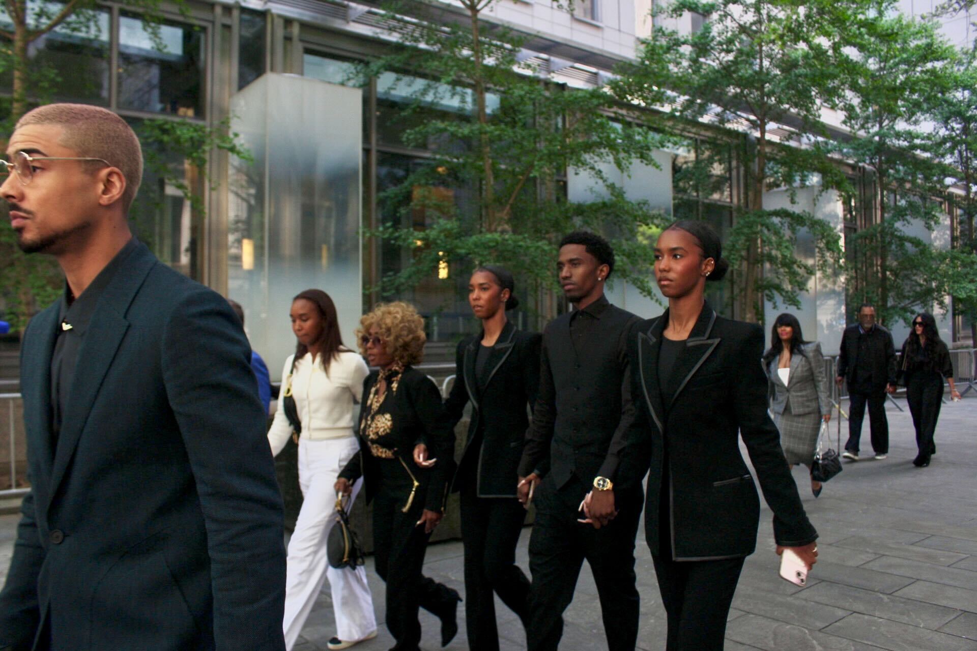 Chance Combs holds hands with Janice Combs, D'Lila Combs, Christian Combs and Jessie Combs