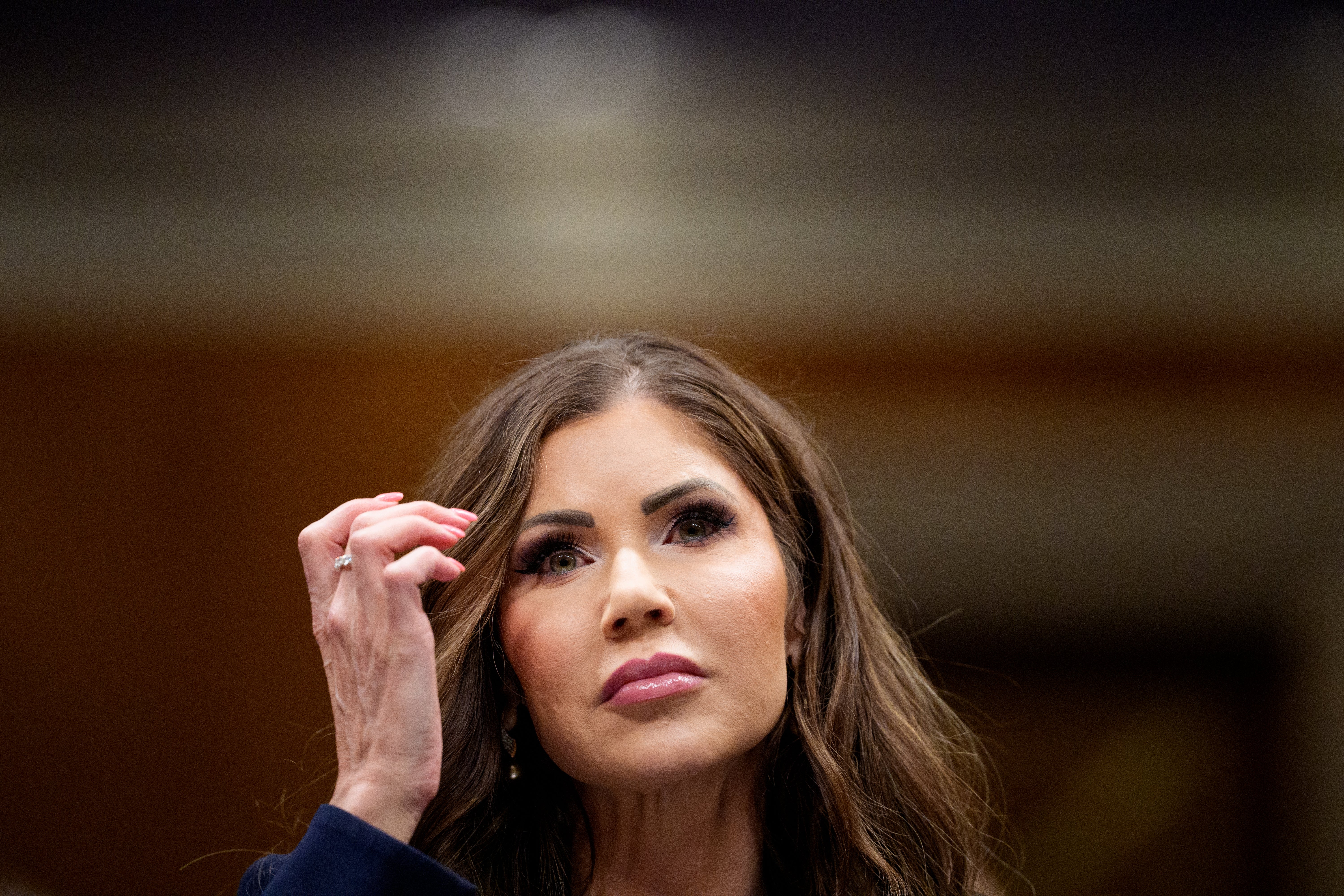 Kristi Noem’s revocation of temporary protected status for Afghans could put women and girls at risk of ‘systemic oppression and gender-based violence,’ aid groups says