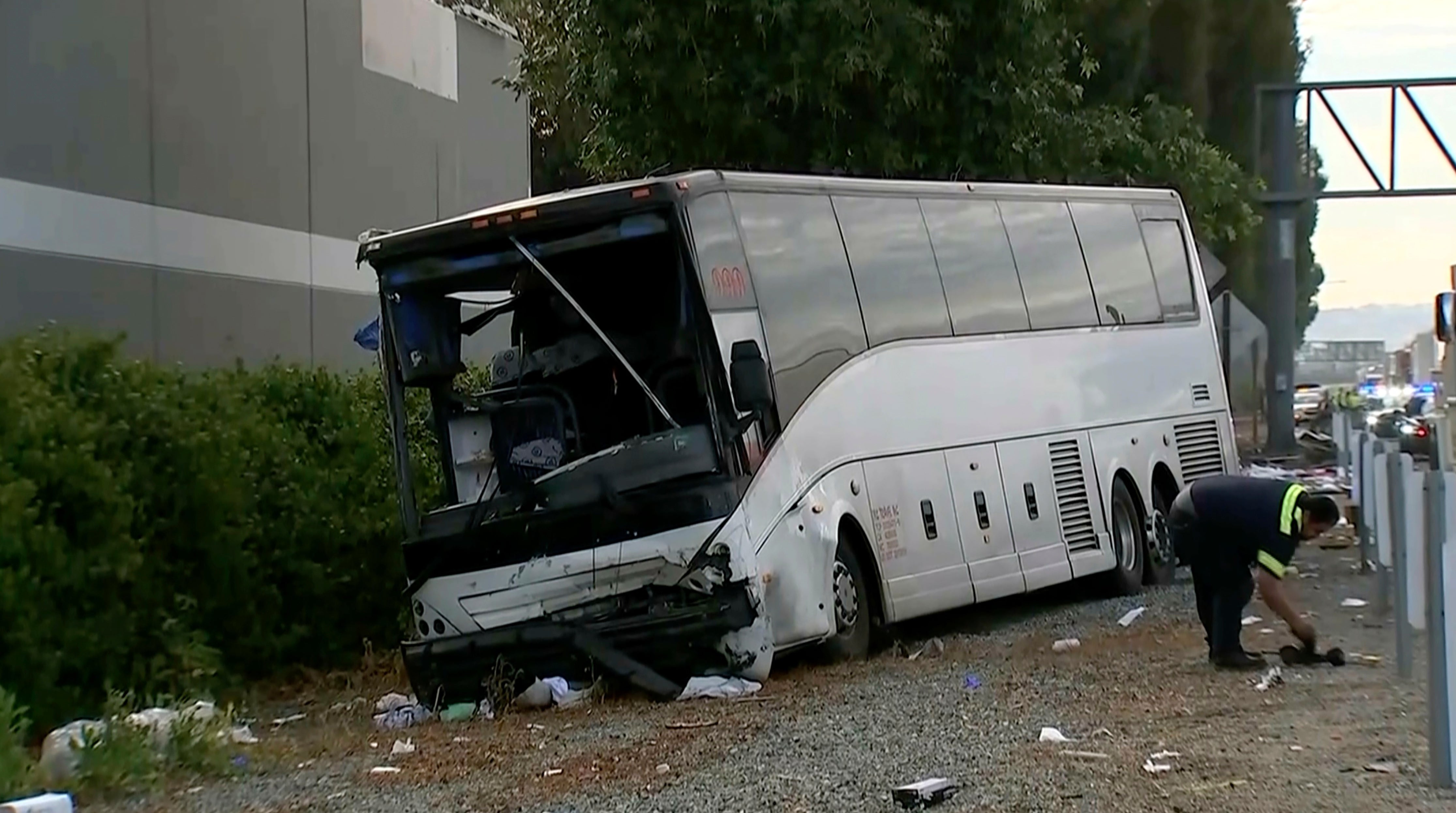 The crashed tour bus after colliding with a sport utility vehicle on Sunday