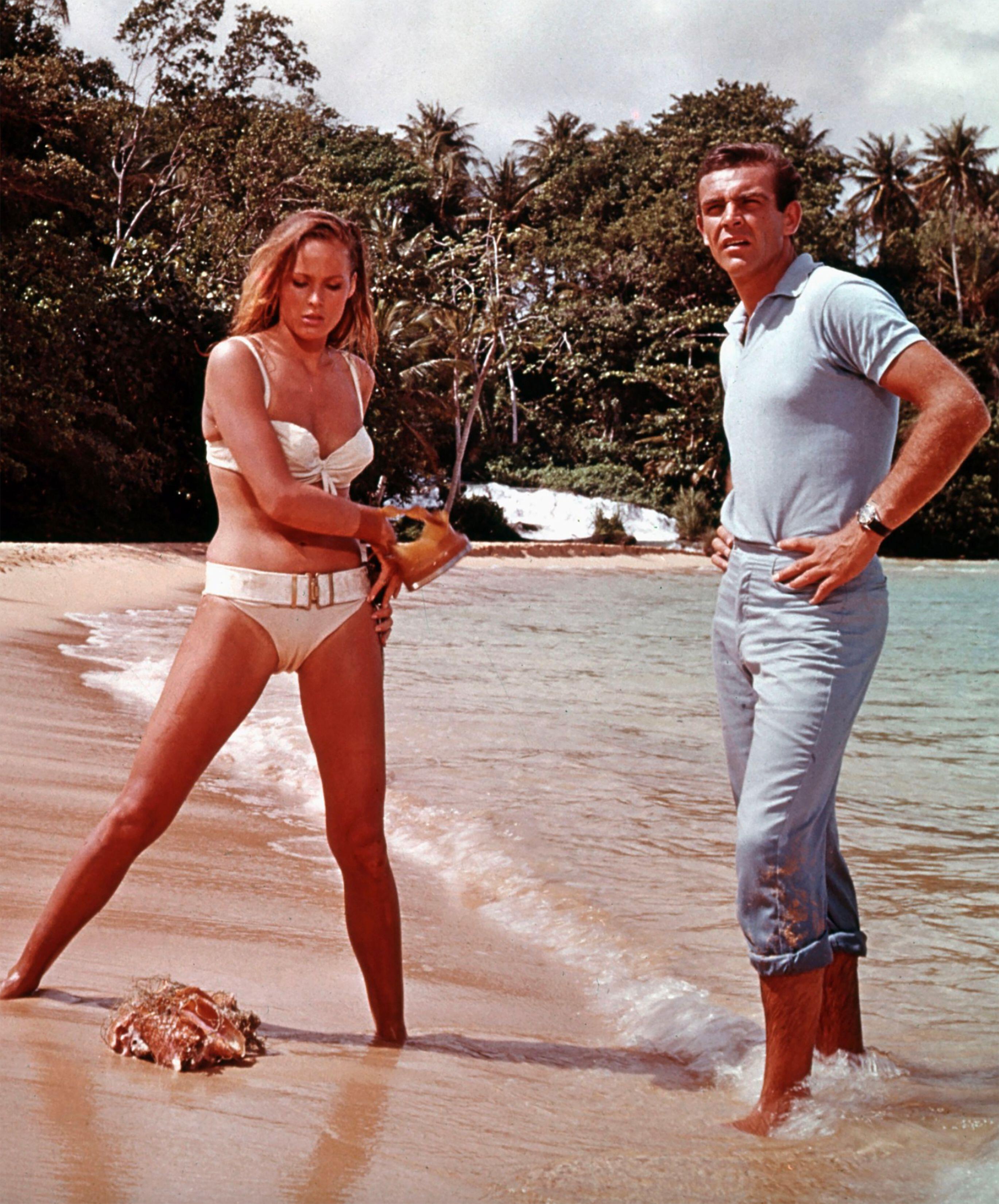 Ursula Andress wore an iconic white belted bikini in the film Dr. No in 1962 (Alamy/PA)