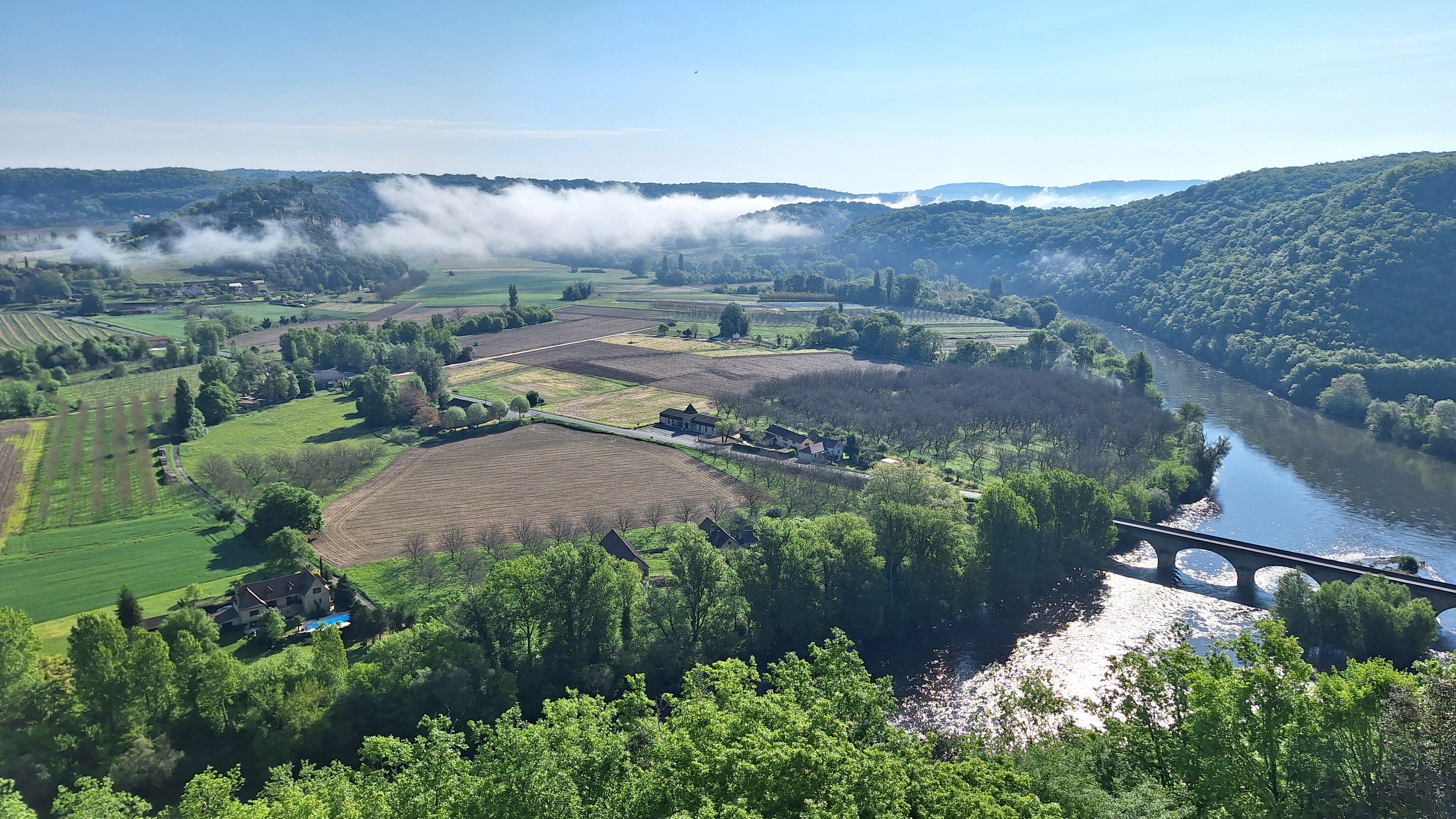The early morning mist clears over the Dordogne