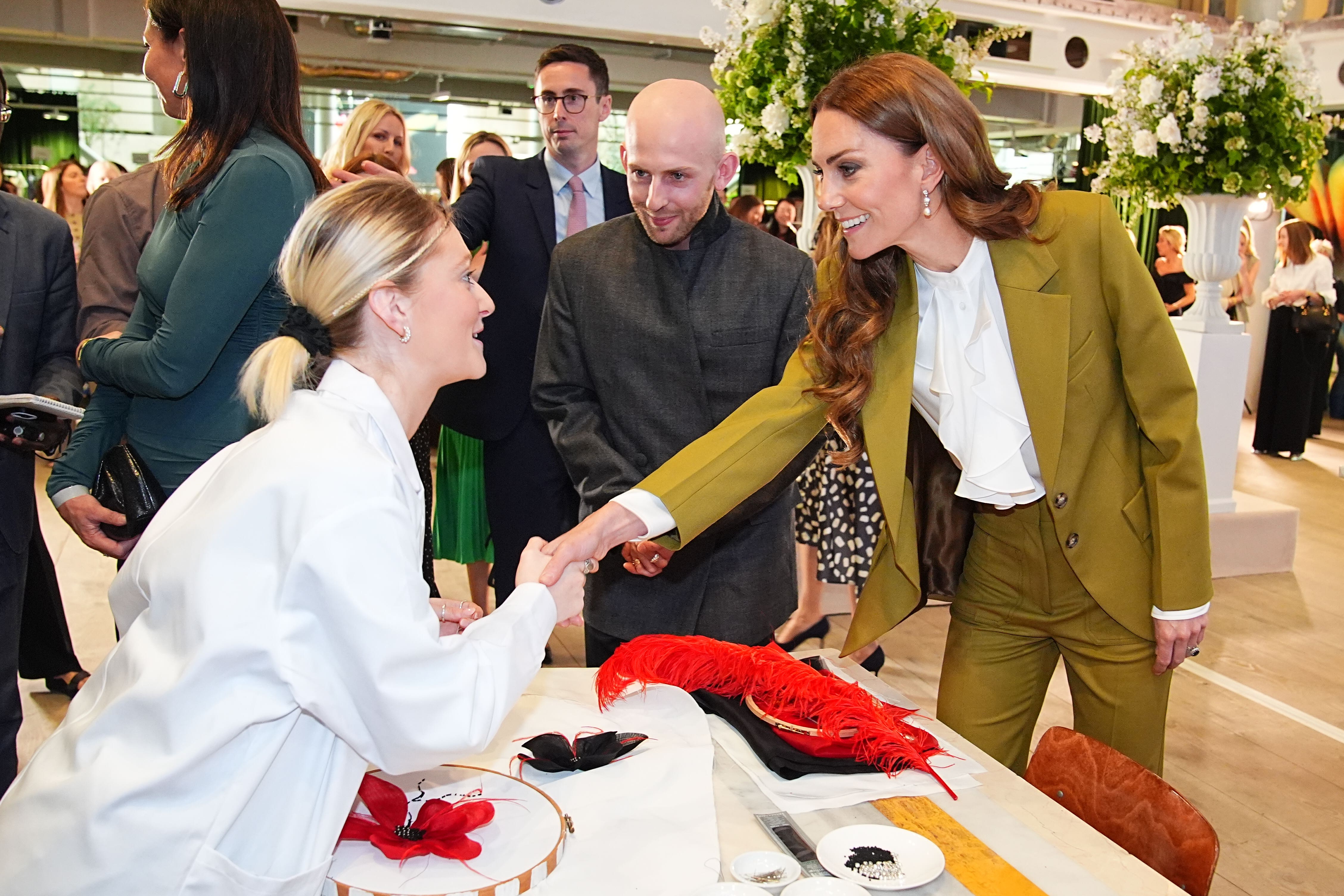 The Princess of Wales tours design spaces with designer Patrick McDowell during a visit to the British Fashion Council to present the Queen Elizabeth II Award for British Design, at the British Fashion Council at 180 Studios in central London (Aaron Chown/PA)
